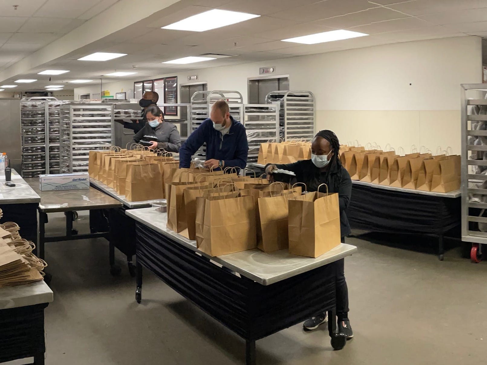 Staff in the kitchen of the JW Marriott Indianapolis prepping meals for March Madness.