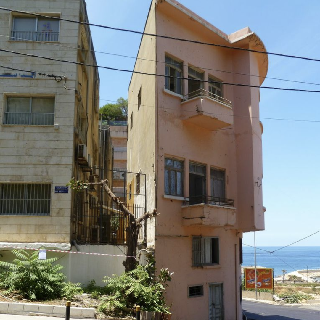 The "Grudge" seen from its widest edge, looking west. The building to the left is the German school in Beirut.