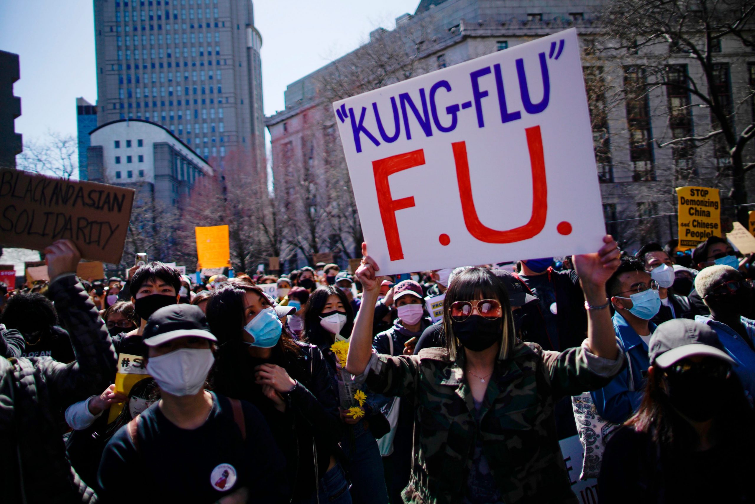 Kung Flu protest sign at rally against violence against Asian Americans
