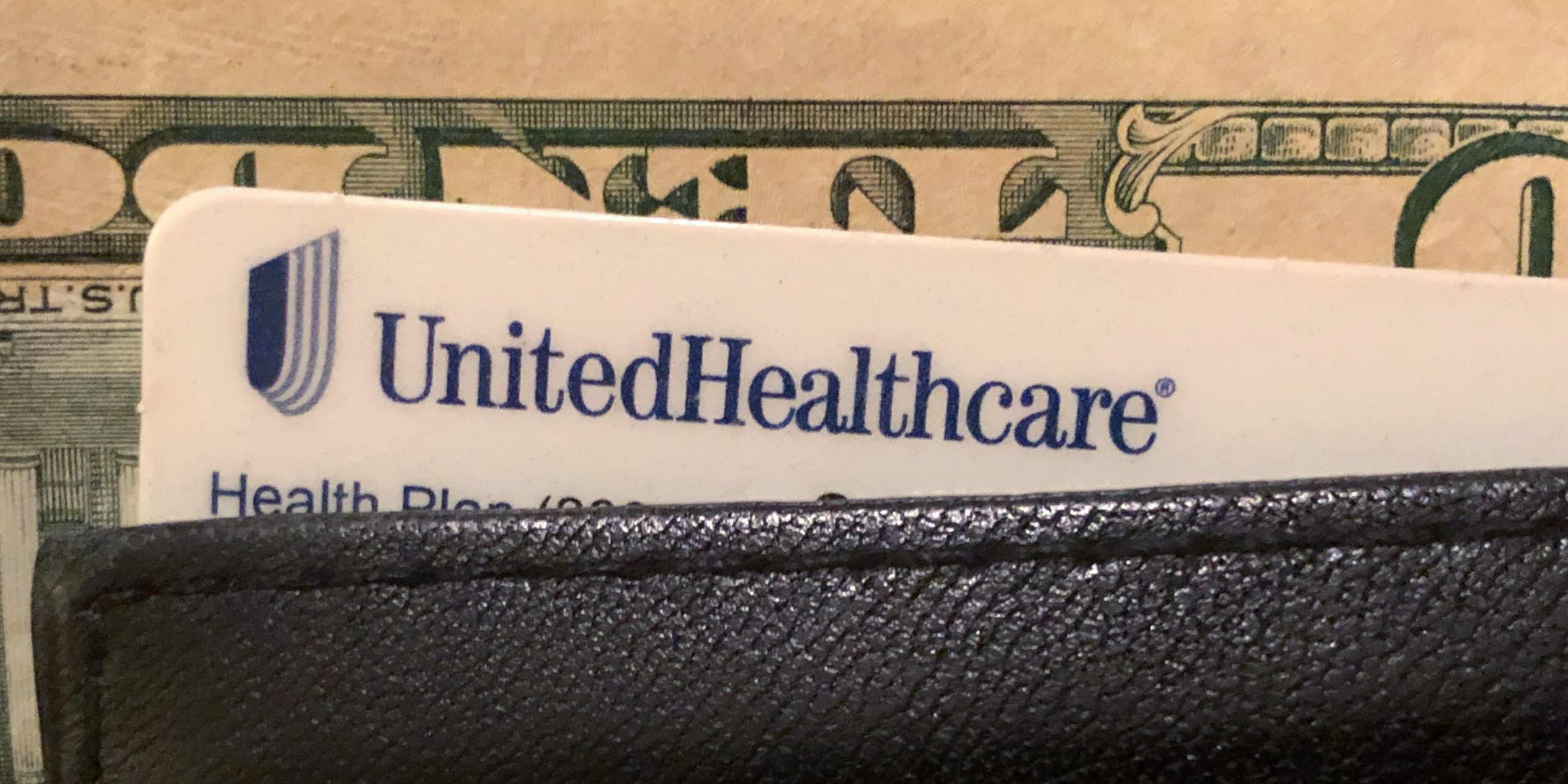 FILE PHOTO: A UnitedHealth Group health insurance card is seen in a wallet in this picture illustration October 14, 2019. REUTERS/Lucy Nicholson/Illustration/File Photo