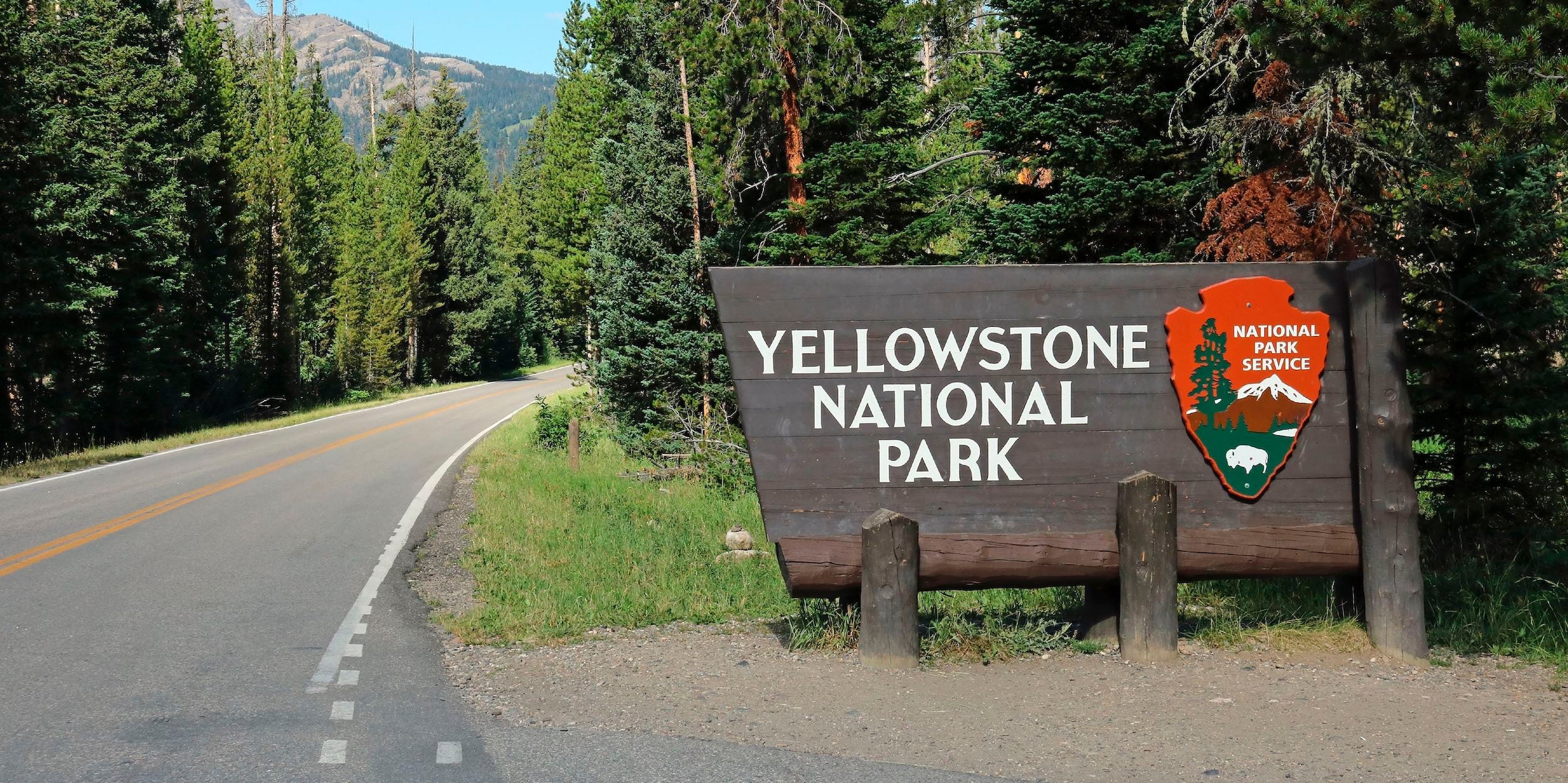 Highway 212 at the northeast entrance into Yellowstone National Park in Wyoming, The northeast entrance to Yellowstone National Park is on US Highway 212 a few miles west of Cooke City Montana as one crosses into Wyoming.