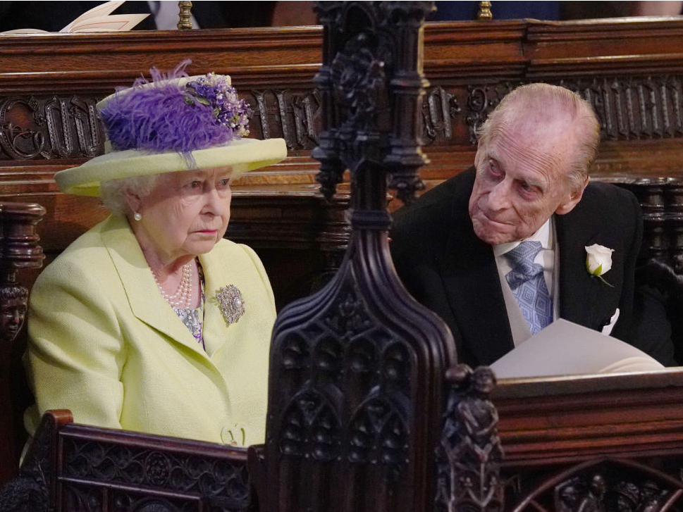 Queen Elizabeth II and Prince Philip, Duke of Edinburgh attend the wedding of Prince Harry to Meghan Markle at St George's Chapel at Windsor Castle on May 19, 2018 in Windsor, England. (Photo by Jonathan Brady - WPA Pool/Getty Images)