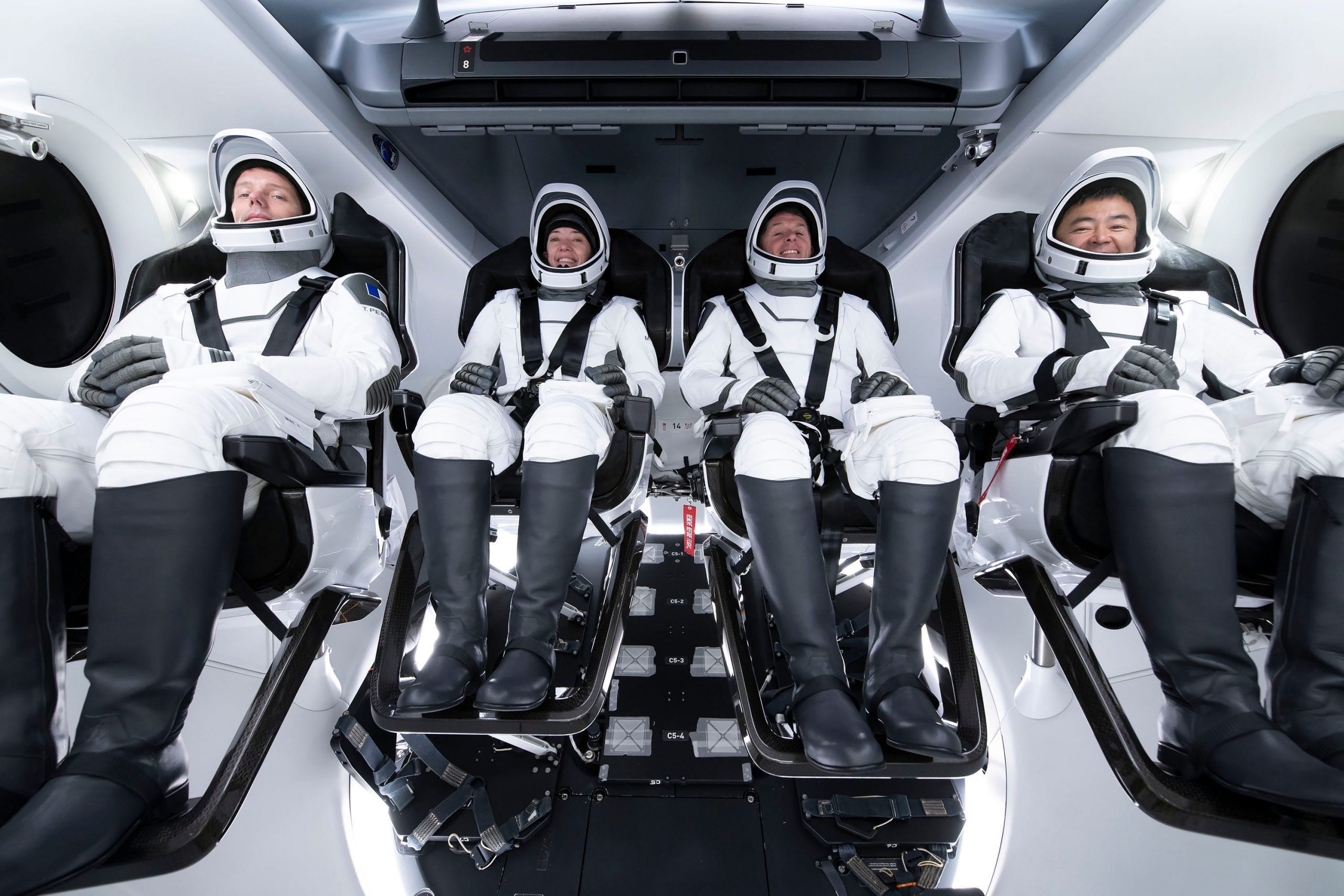 crew 2 astronauts crew dragon spaceship