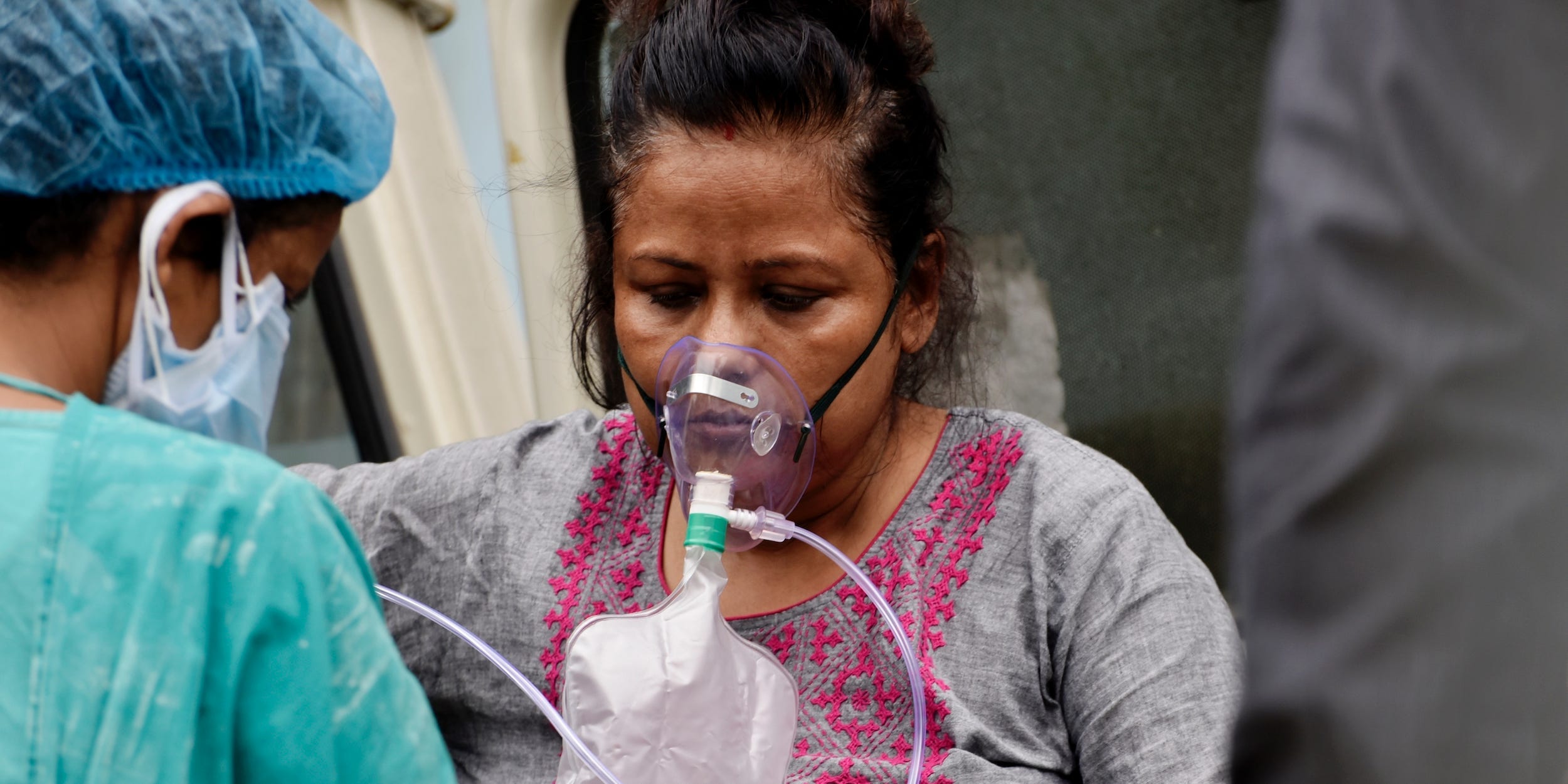A Covid-19 patient gets admitted to a government hospital in Kolkata, India, 22 April, 2021. India reported 314,835 fresh coronavirus infections on Thursday according to an Indian media report.