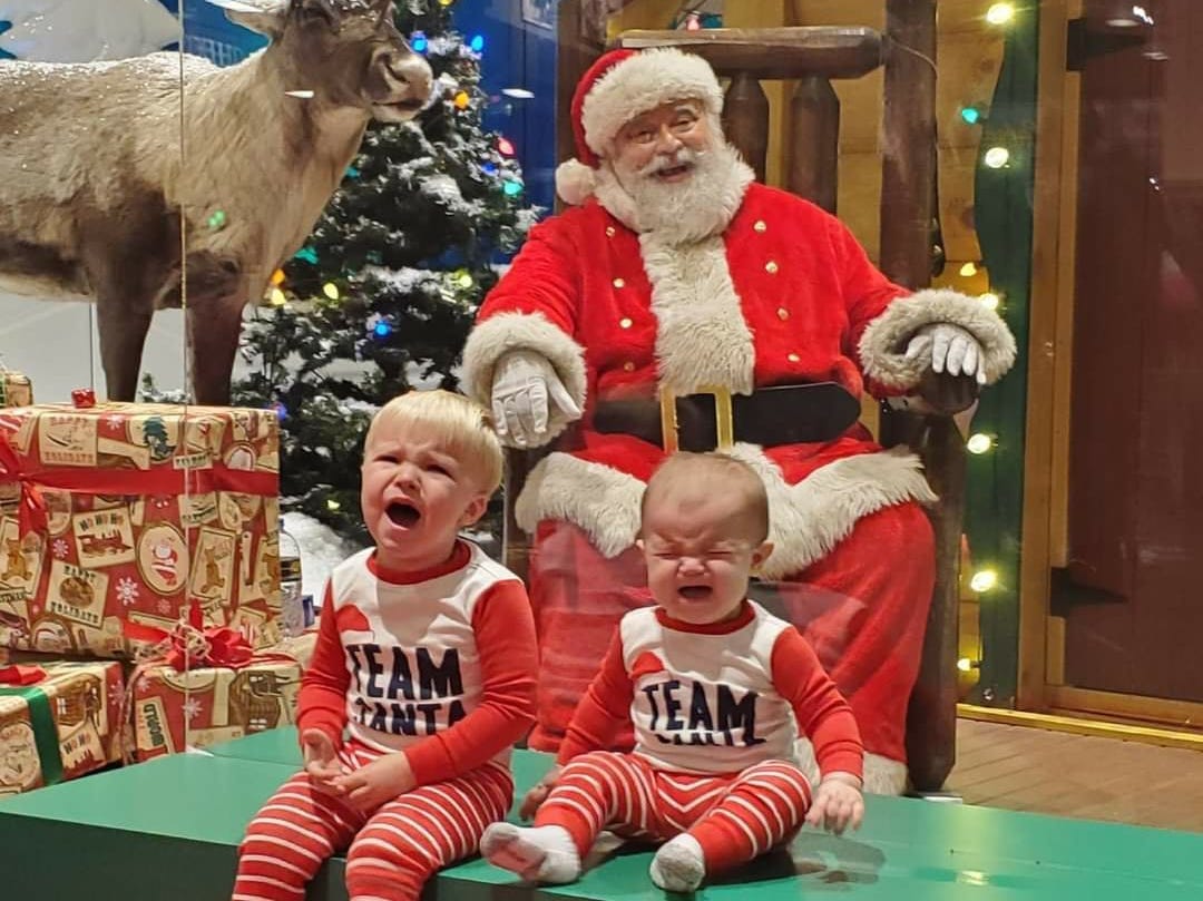 Photos with Santa this year featured a plastic barrier.