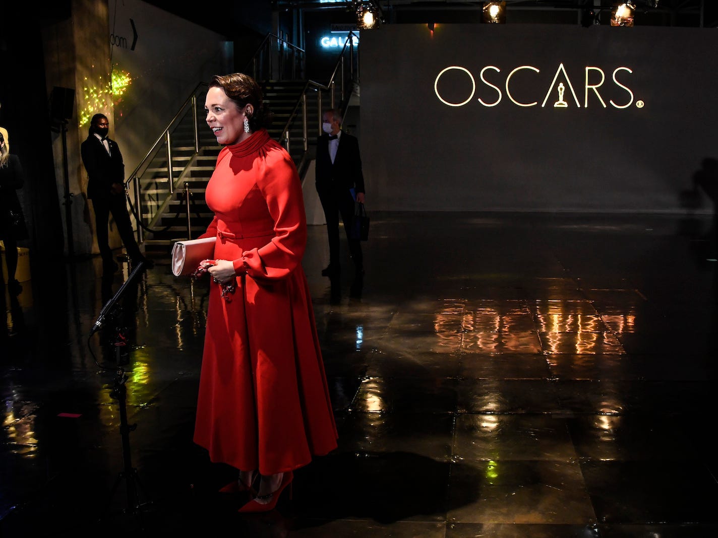 Olivia Colman is interviewed upon arrival at a screening of the Oscars on Monday, April 26, 2021 in London. (AP Photo/Alberto Pezzali, Pool)