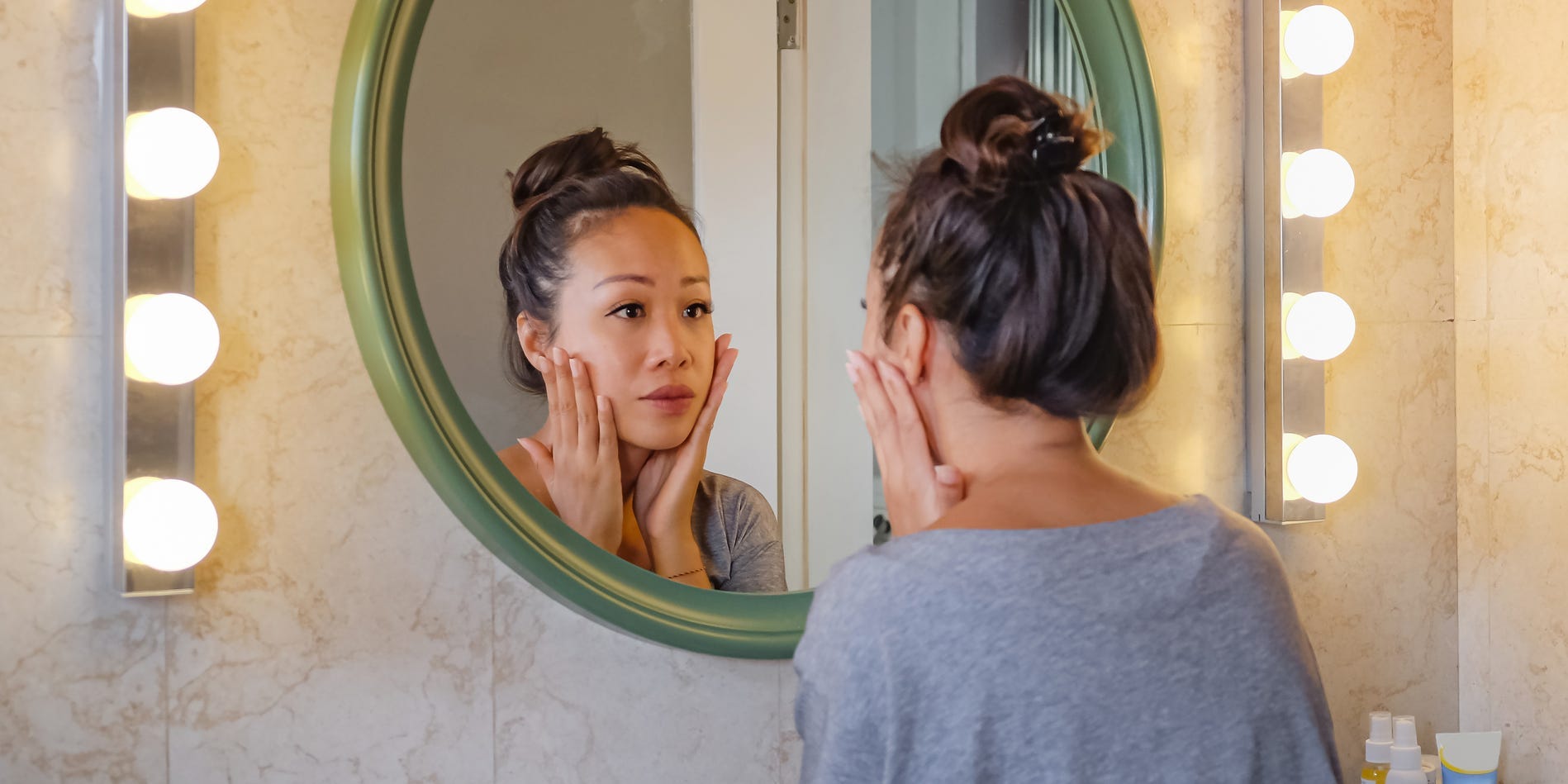 looking in mirror skincare skin acne face wash
