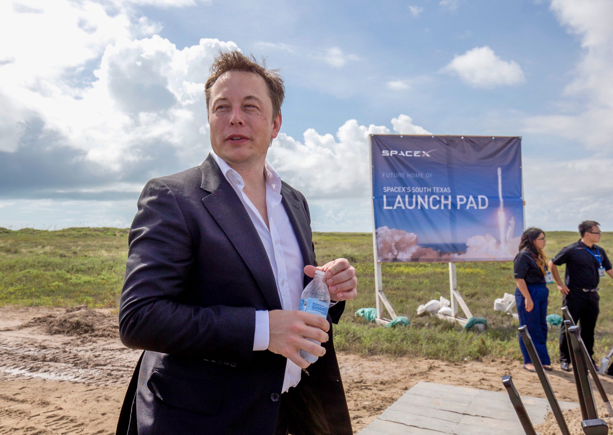elon musk spacex south texas launch site sign boca chica groundbreaking event september 2014 GettyImages 539719466 edited