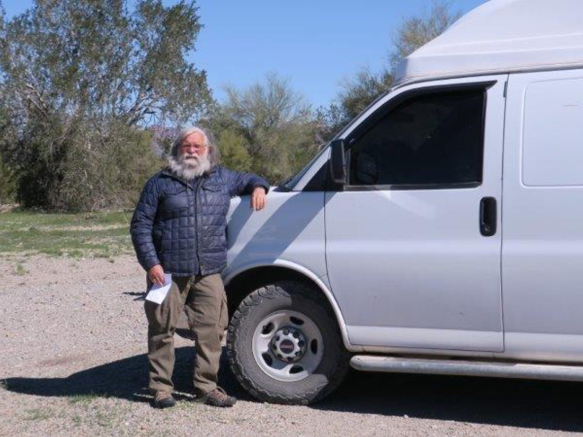 Bob Wells outside van