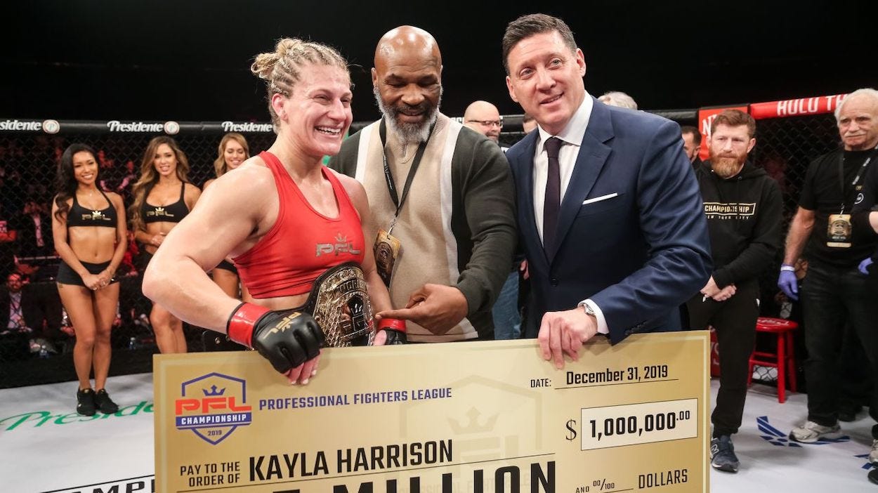 Kayla Harrison and Mike Tyson