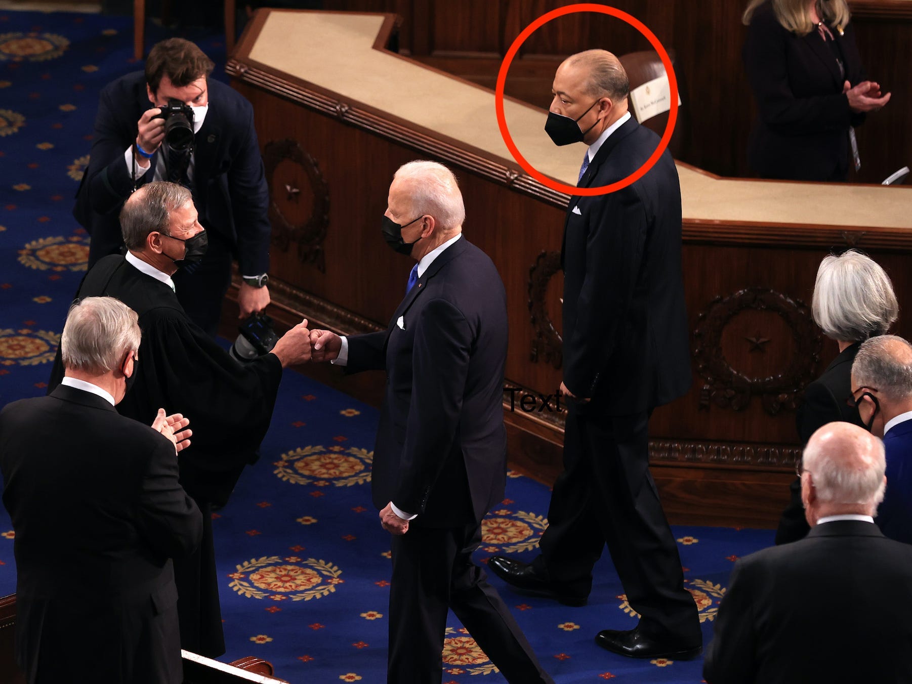House Sergeant at Arms, General William Walker, escorts President Joe Biden in the chamber.