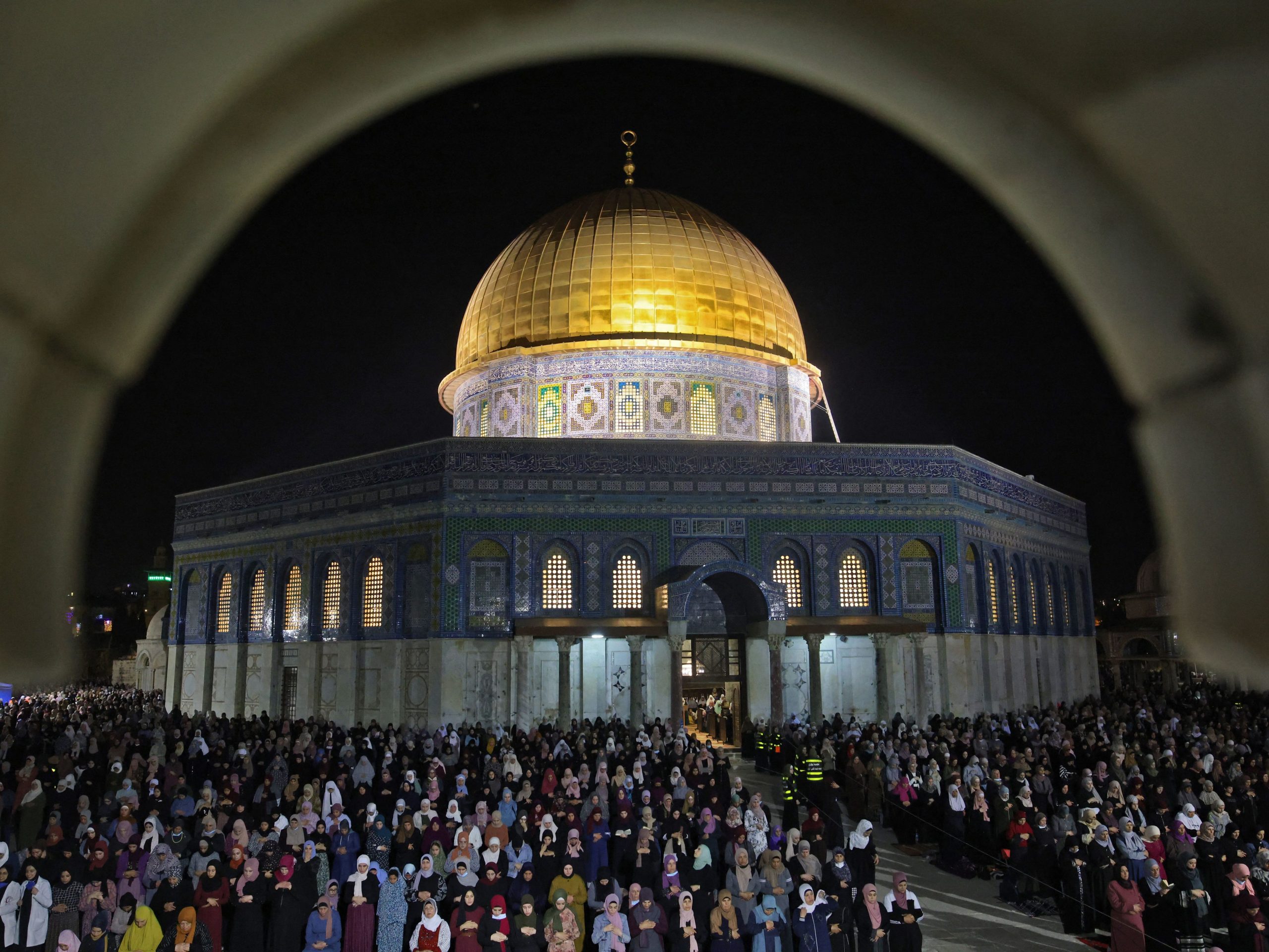 Palestinians pray on Laylat al-Qadr outside the Dome of the Rock