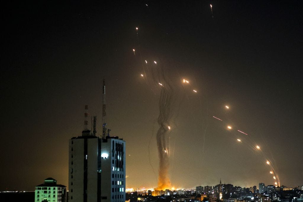A rocket launched from Gaza city controlled by the Palestinian Hamas movement, is intercepted by Israel's Iron Dome aerial defence system, on May 11, 2021
