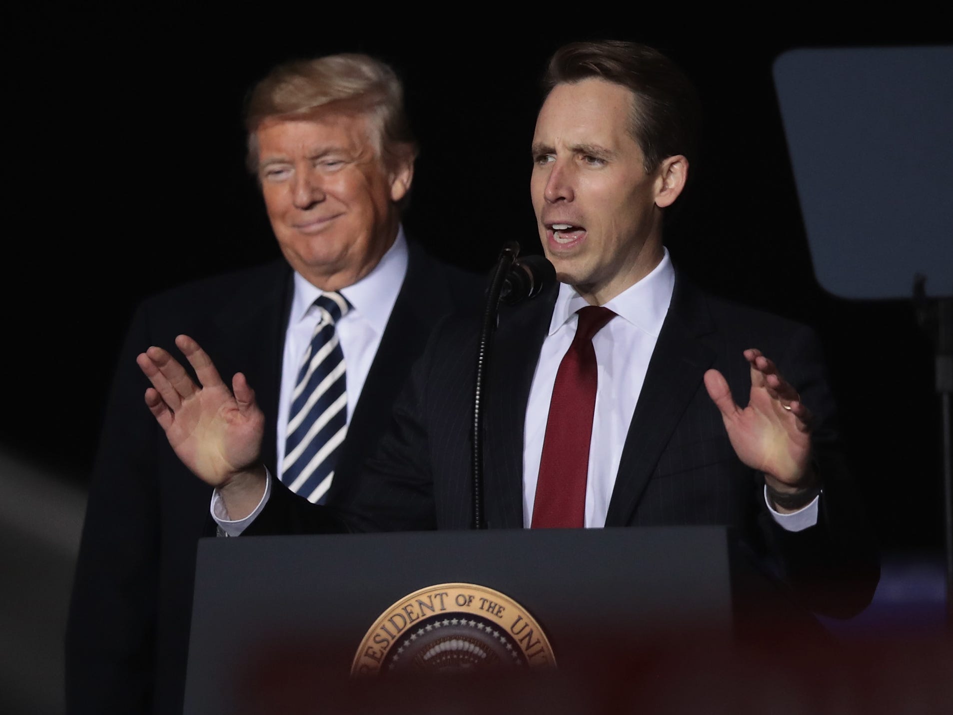 Former President Donald Trump and Missouri Sen. Josh Hawley speak at a rally.