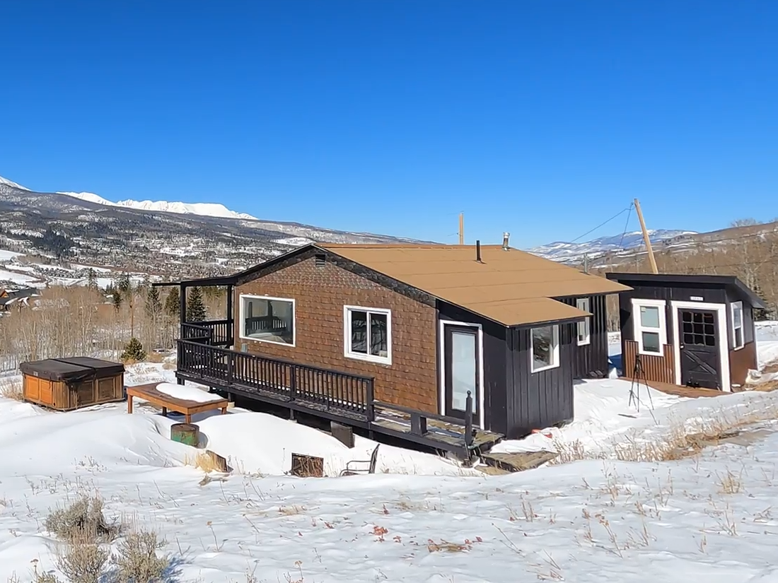 Keenan Laurence Tiny Home with Snowy Mountains 2