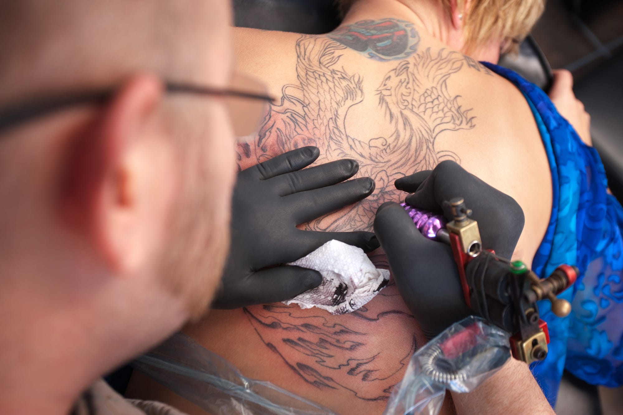 tattoo artist back