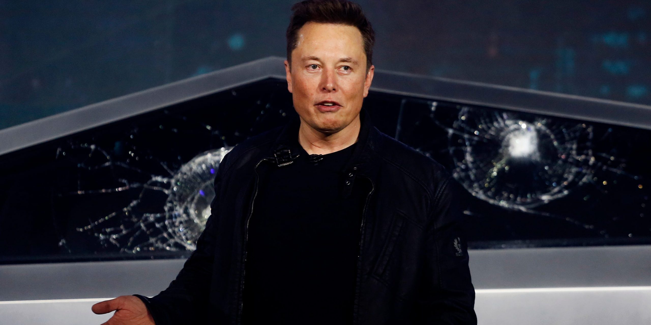 FILE - In this Nov. 21, 2019, file photo, Tesla CEO Elon Musk introduces the Cybertruck at Tesla's design studio in Hawthorne, Calif. Tesla CEO Elon Musk appears to have hit all the milestones necessary to receive a stock award currently worth about $730 million to pad the eccentric billionaire's already vast fortune. The electric car maker ended Wednesday, May 6, 2020, with an average market value of $100.4 billion for the past six months, according to data drawn from FactSet Research. (AP Photo/Ringo H.W. Chiu, File)