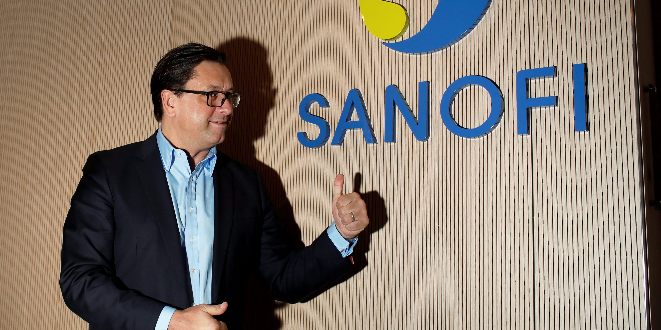FILE PHOTO: Paul Hudson, chief executive officer of Sanofi, poses during the annual results news conference in Paris, France, February 6, 2020. REUTERS/Benoit Tessier