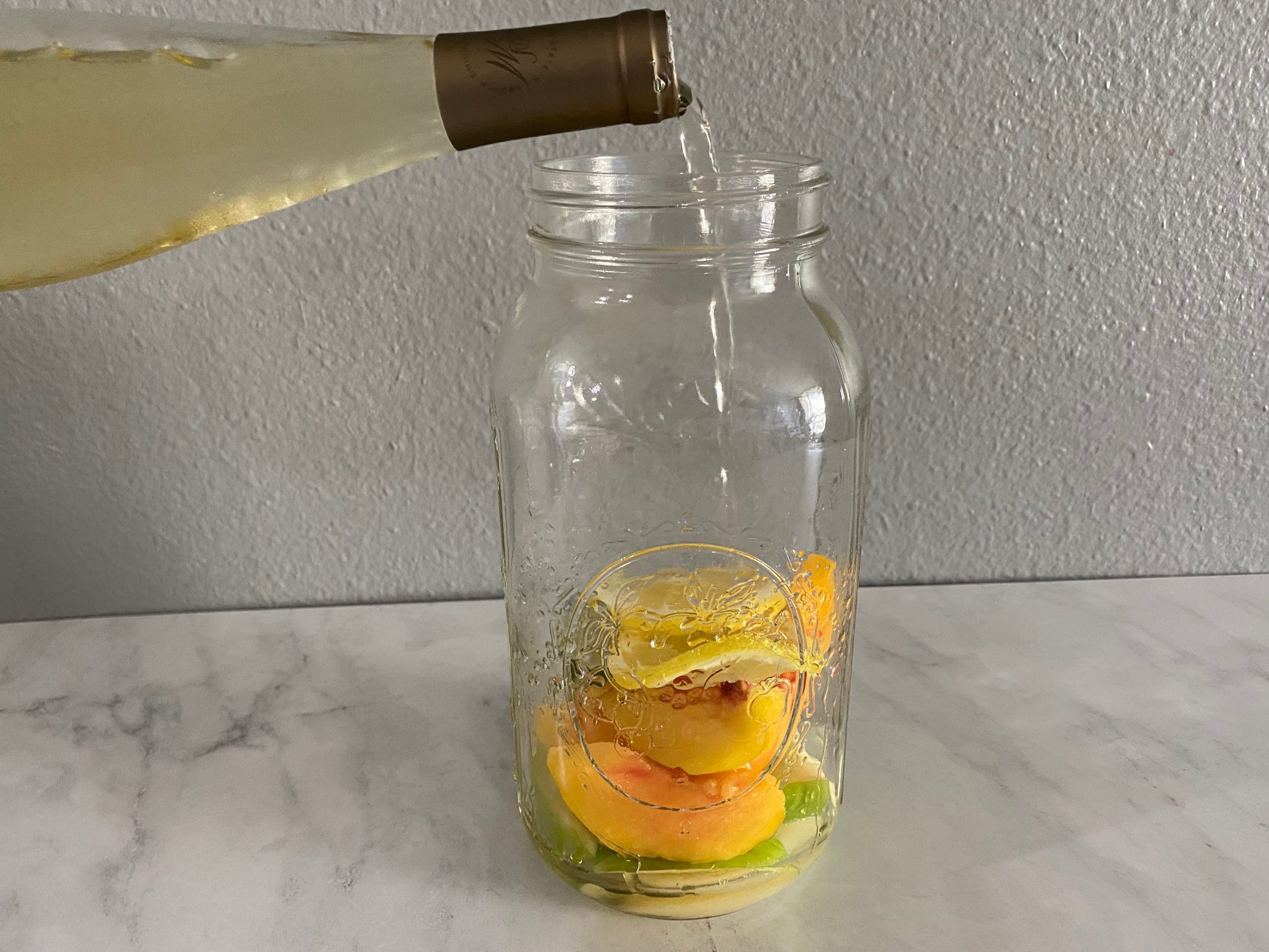 Rachael Ray sangria pouring white wine