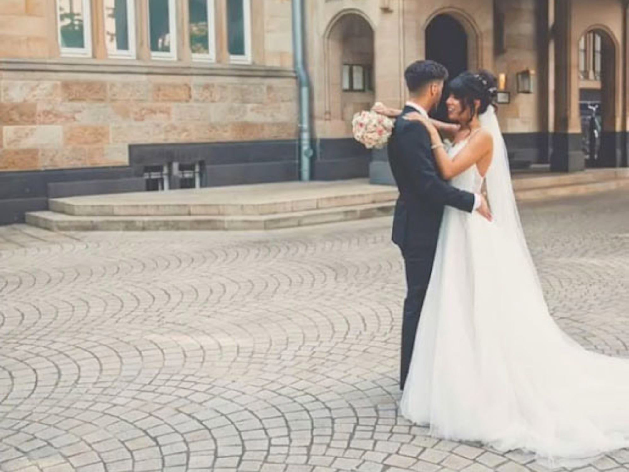 Sarah Villard poses with her fake groom