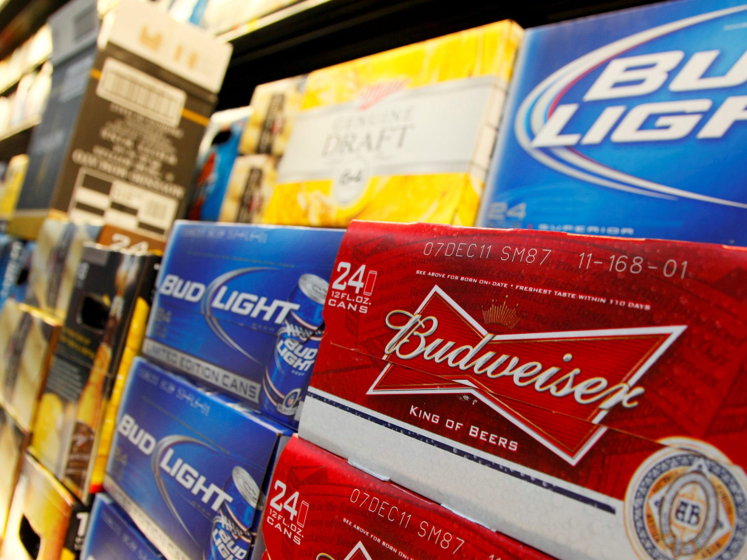 FILE PHOTO: Anheuser Busch's Budweiser and Bud Light Beer on display at a Wal-Mart store in Chicago, January 24, 2012. REUTERS/John Gress