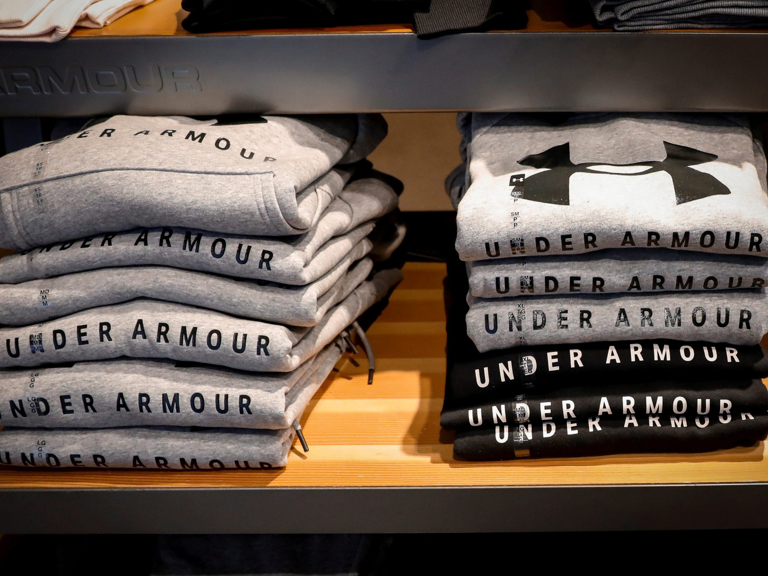 FILE PHOTO: Products are displayed in an Under Armour store in New York City, U.S., November 4, 2019. REUTERS/Brendan McDermid