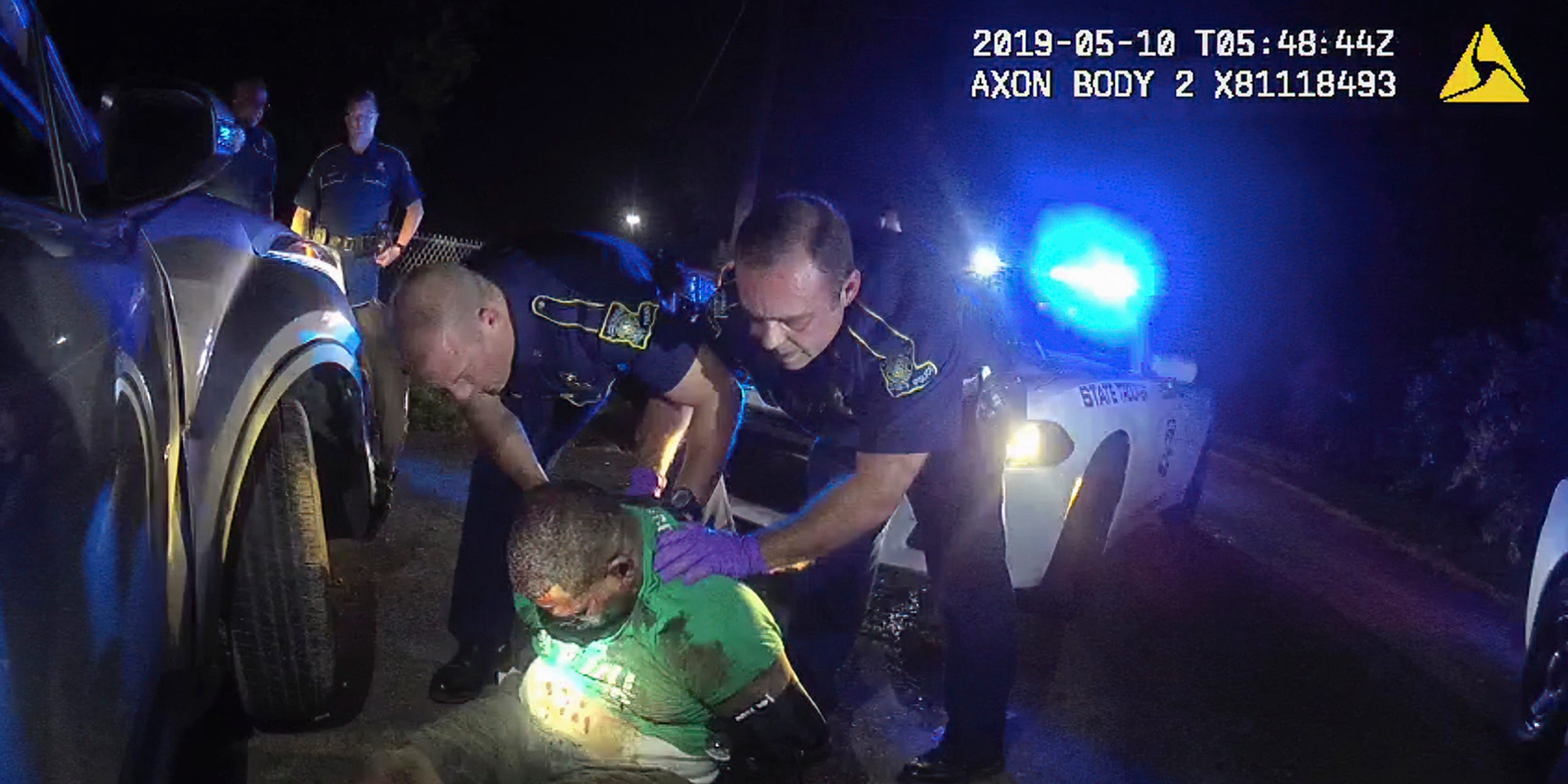 This image from video from Louisiana state police state trooper Dakota DeMoss' body-worn camera, shows troopers holding up Ronald Greene before paramedics arrived on May 10, 2019, outside of Monroe, Louisiana.