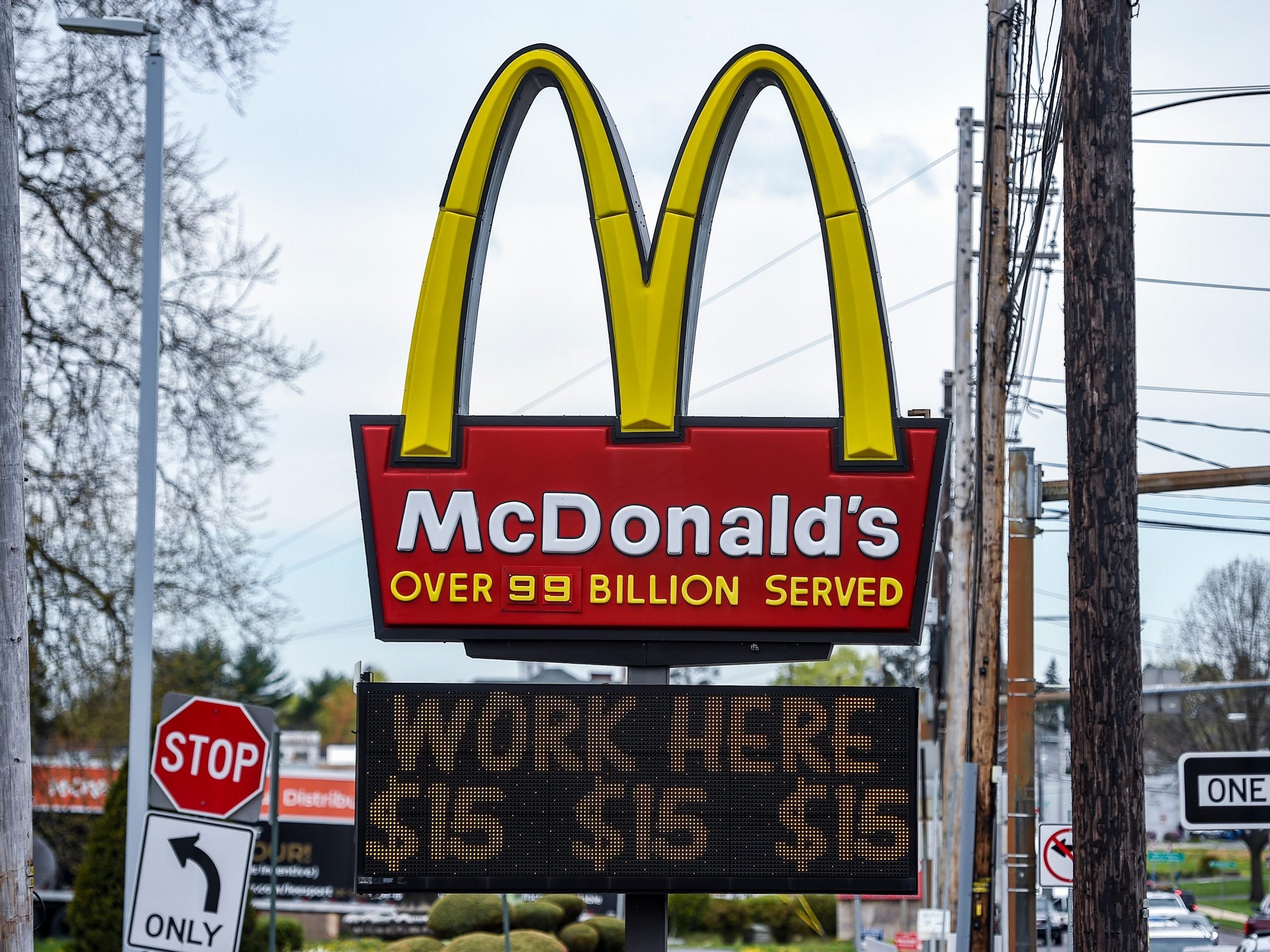 Sign at McDonald's restaurant on Penn Ave in Sinking Spring, Pennsylvania, using its $15 wage to lure in new staff.