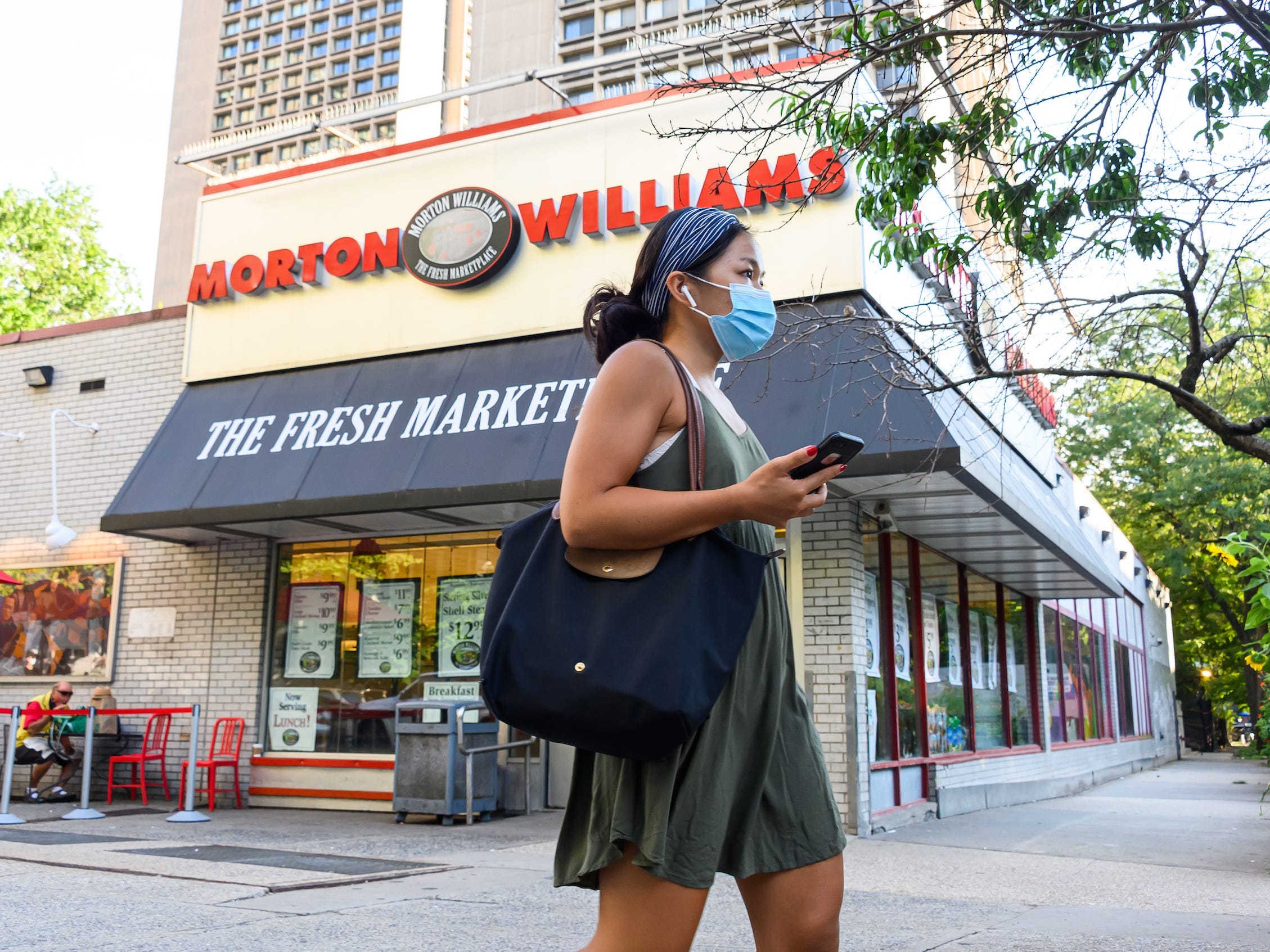Morton Williams, person wearing a mask in New York City in August 2020.