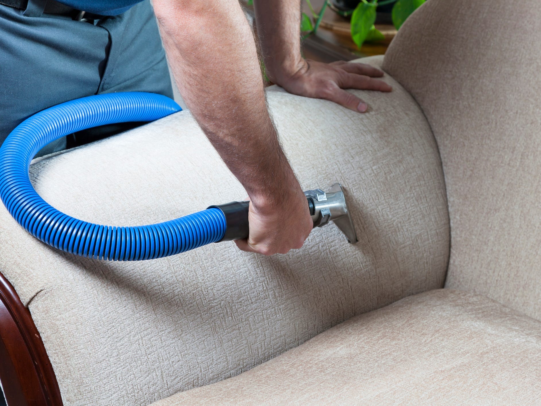 Steam cleaning a couch