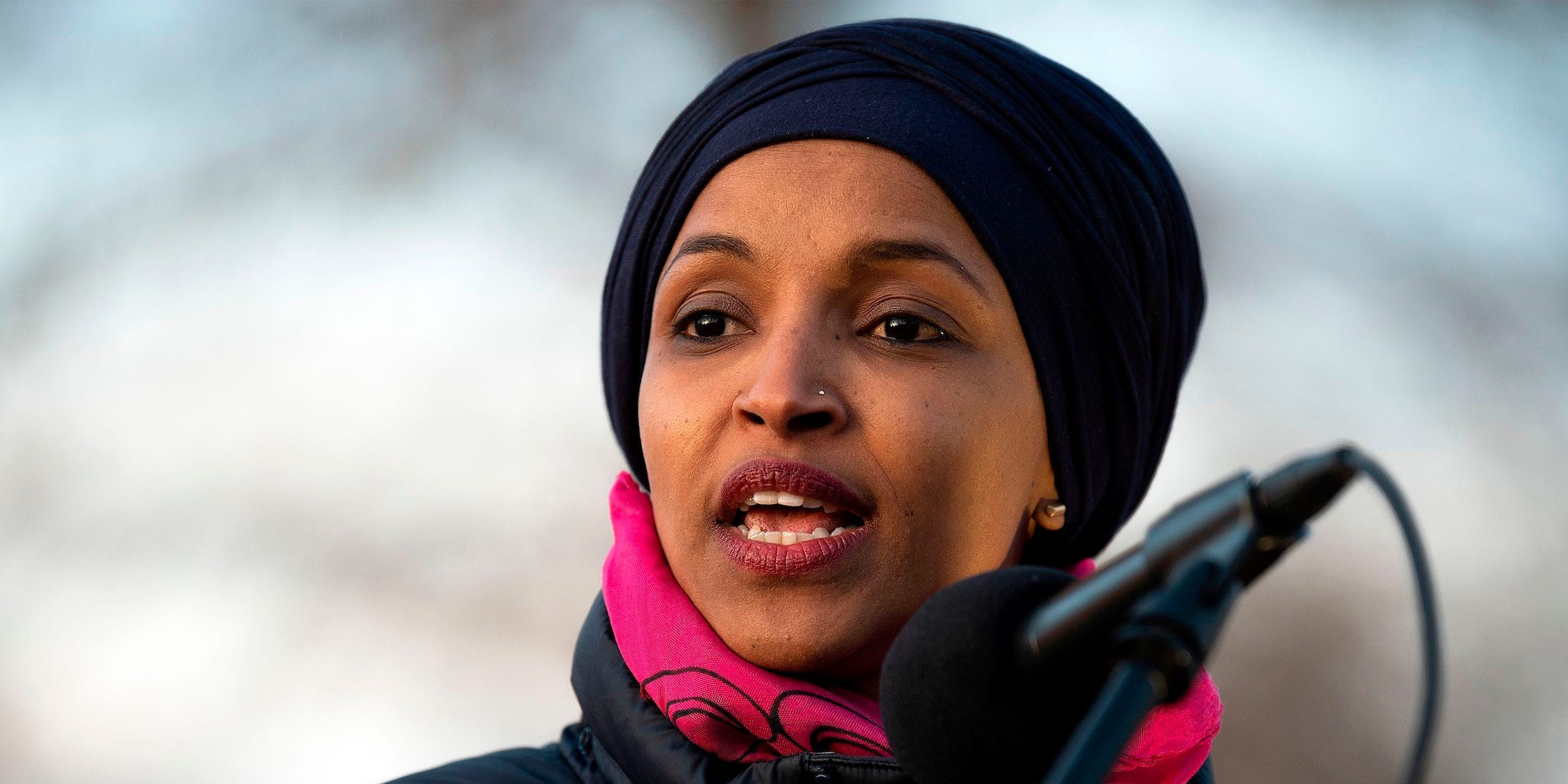 ilhan omar joe biden trump wall racist