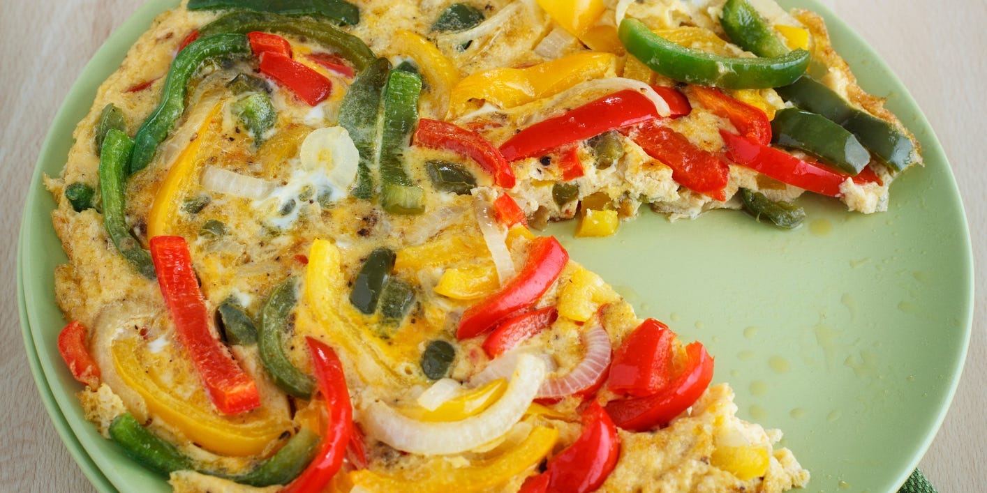 Omelette or frittata with green and red bell peppers and onions