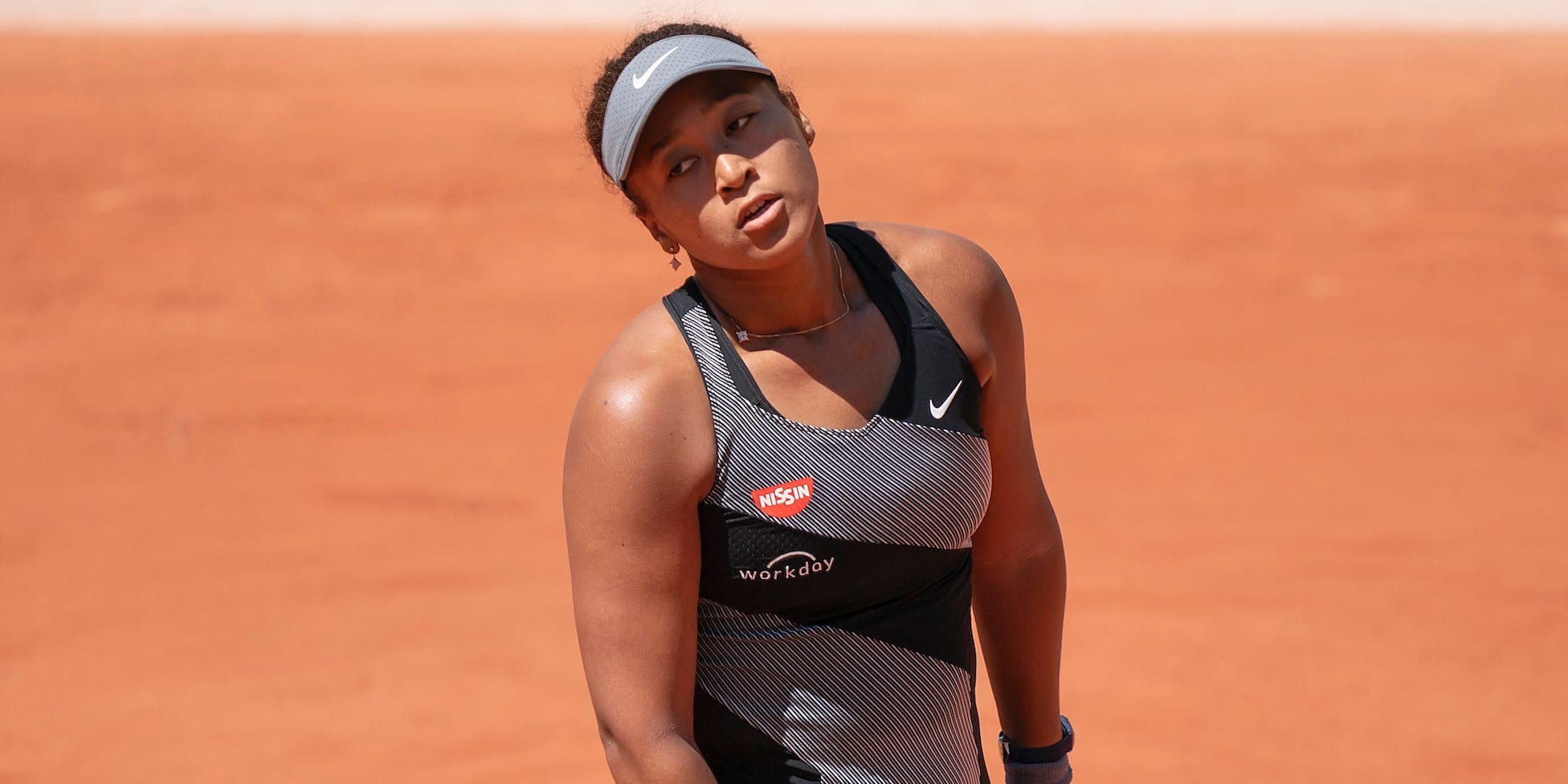 Naomi Osaka (JPN) reacts during her match against Patricia Maria Tig (ROU) at Roland Garros Stadium..JPG