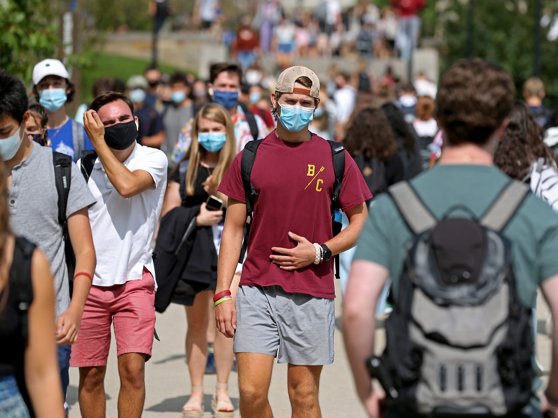 students wearing masks at Boston College campus