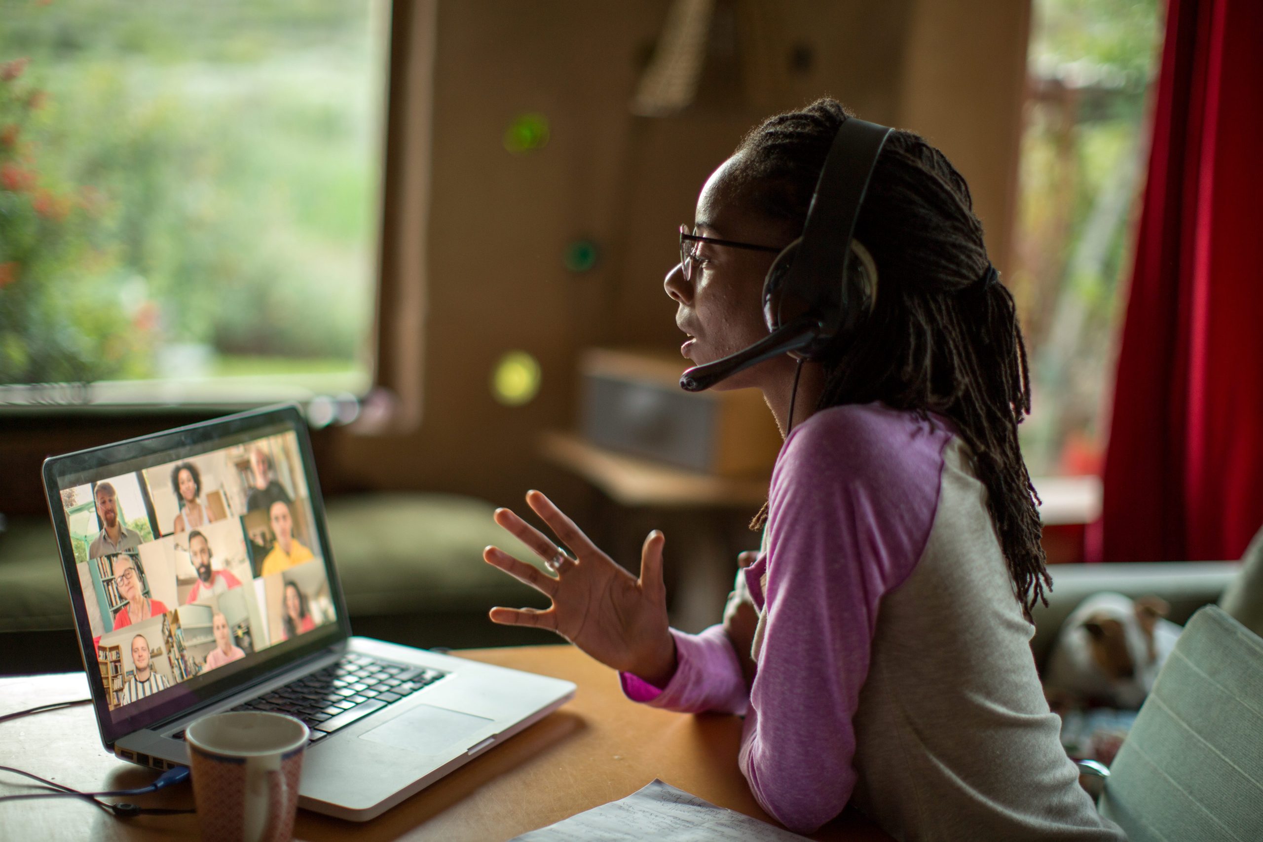 A woman is speaking on a video call