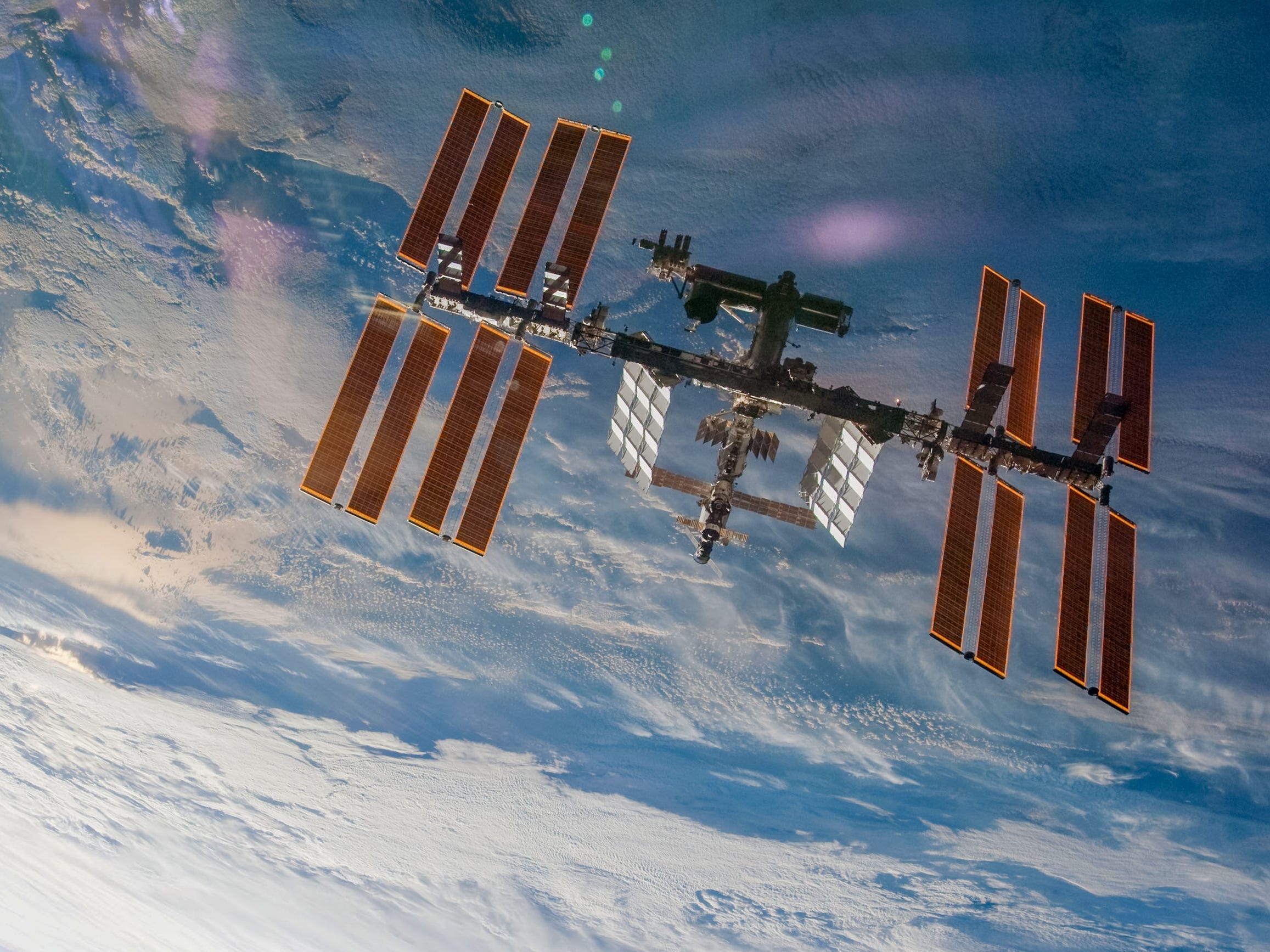 nasa international space station iss earth clouds sts130 shuttle crew photo february 19 2010 iss_sts130_big