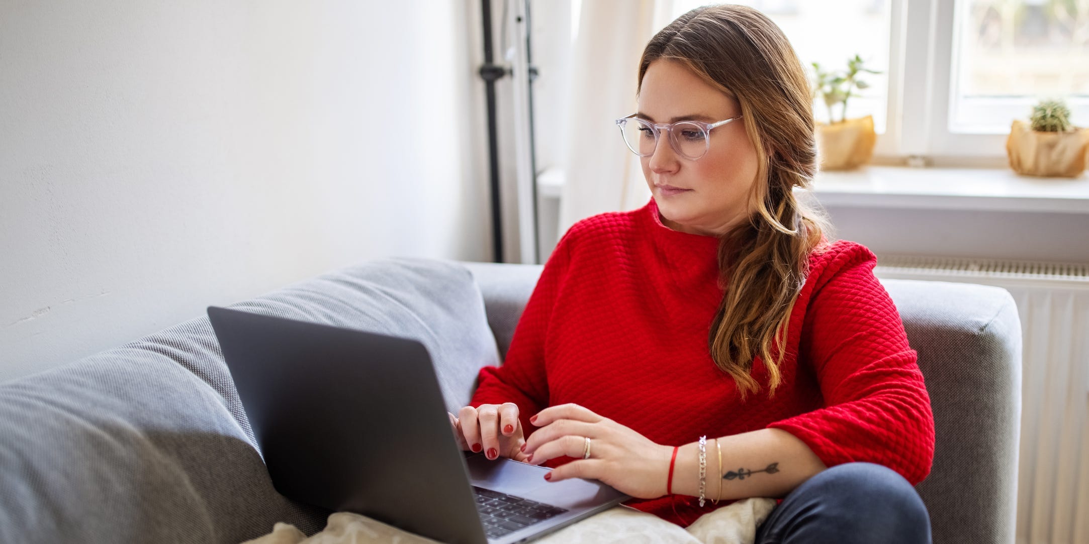 using laptop at home typing