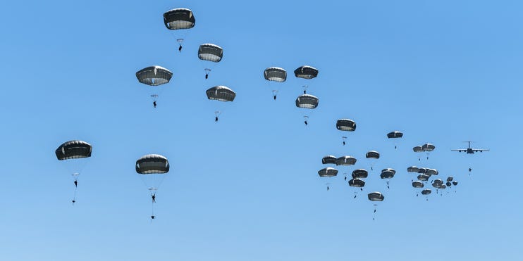 Soldiers with the 173rd Airborne Brigade parachute May 11, 2021, from an Air Force C-17 Globemaster III during Swift Response 21 at Cheshnegirovo Air Base, Bulgaria