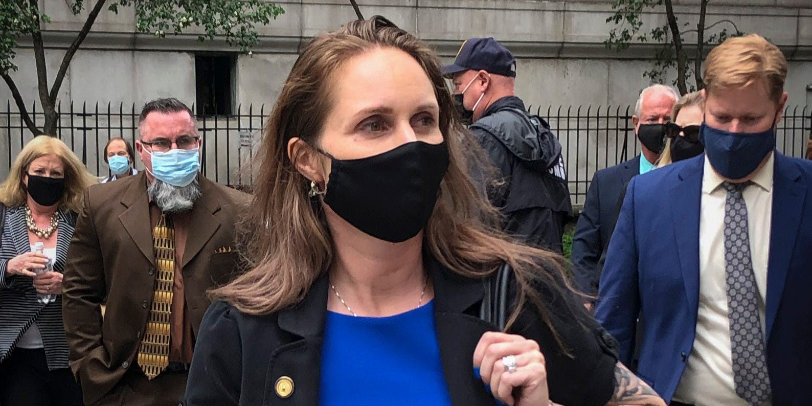 Natalie Mayflower Sours Edwards, center, leaves court after receiving a six-month prison sentence for leaking confidential financial reports to a journalist at Buzzfeed, Thursday June 3, 2021, in New York.