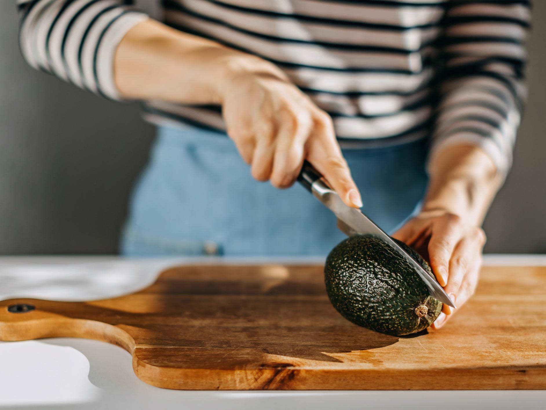 Cutting open an avocado