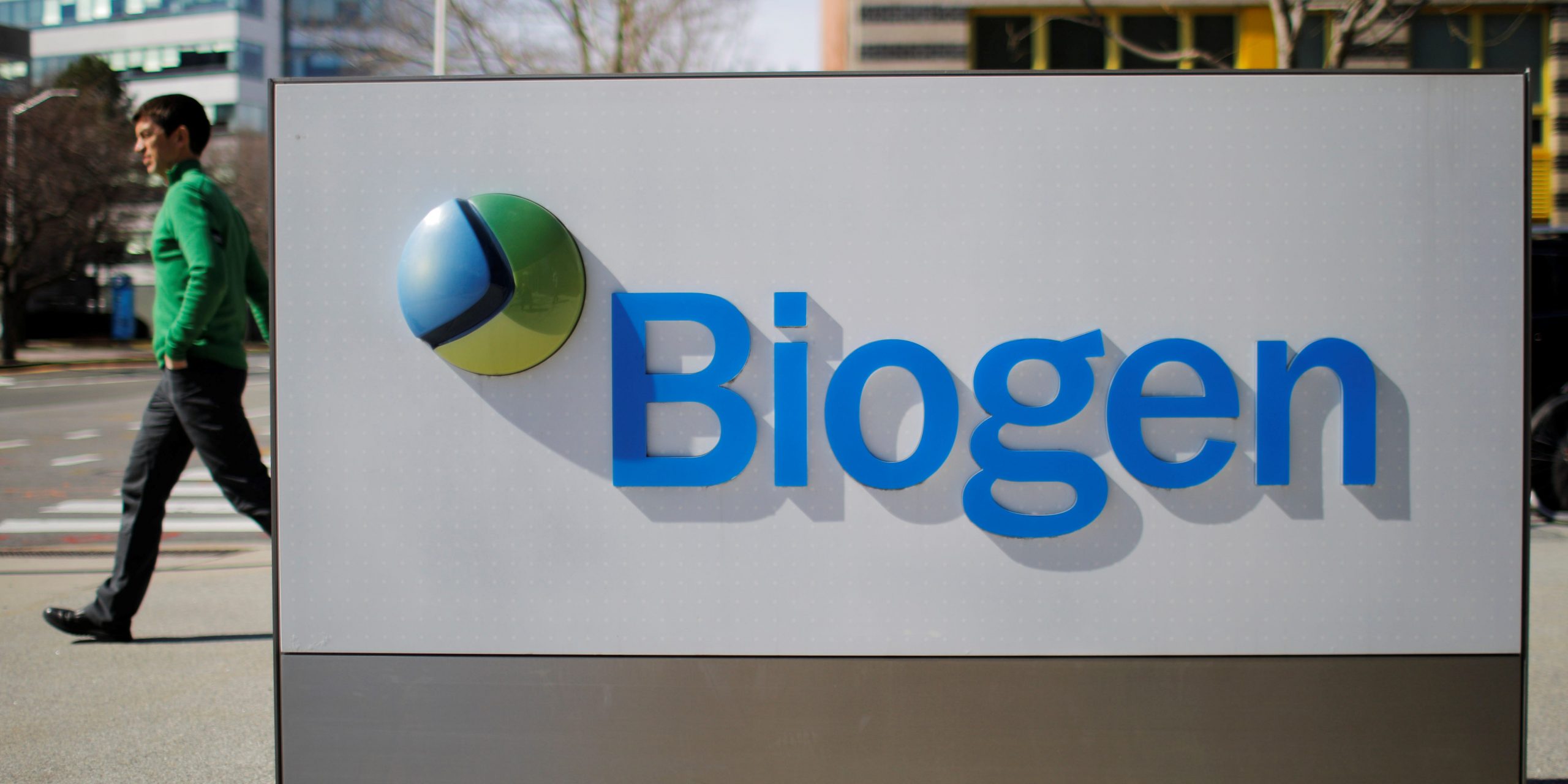 FILE PHOTO: A sign marks a Biogen facility, some of whose employees have tested positive for the coronavirus after attending a meeting in Boston, in Cambridge, Massachusetts, U.S., March 9, 2020.   REUTERS/Brian Snyder