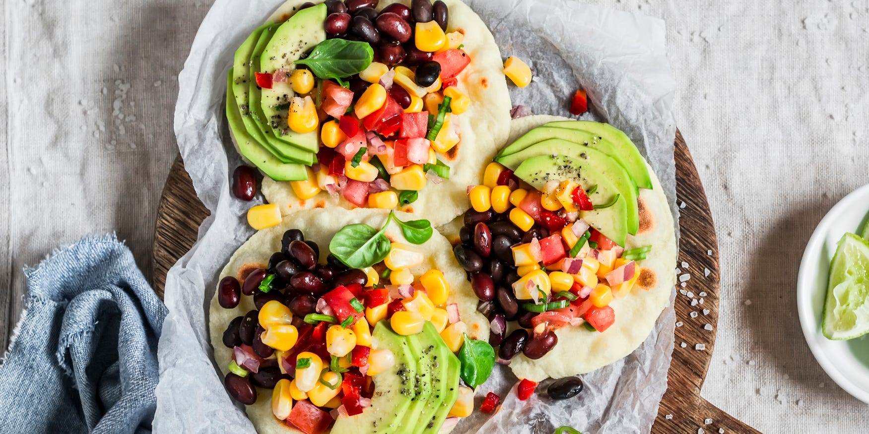 tostados with avocado beans corn and salsa