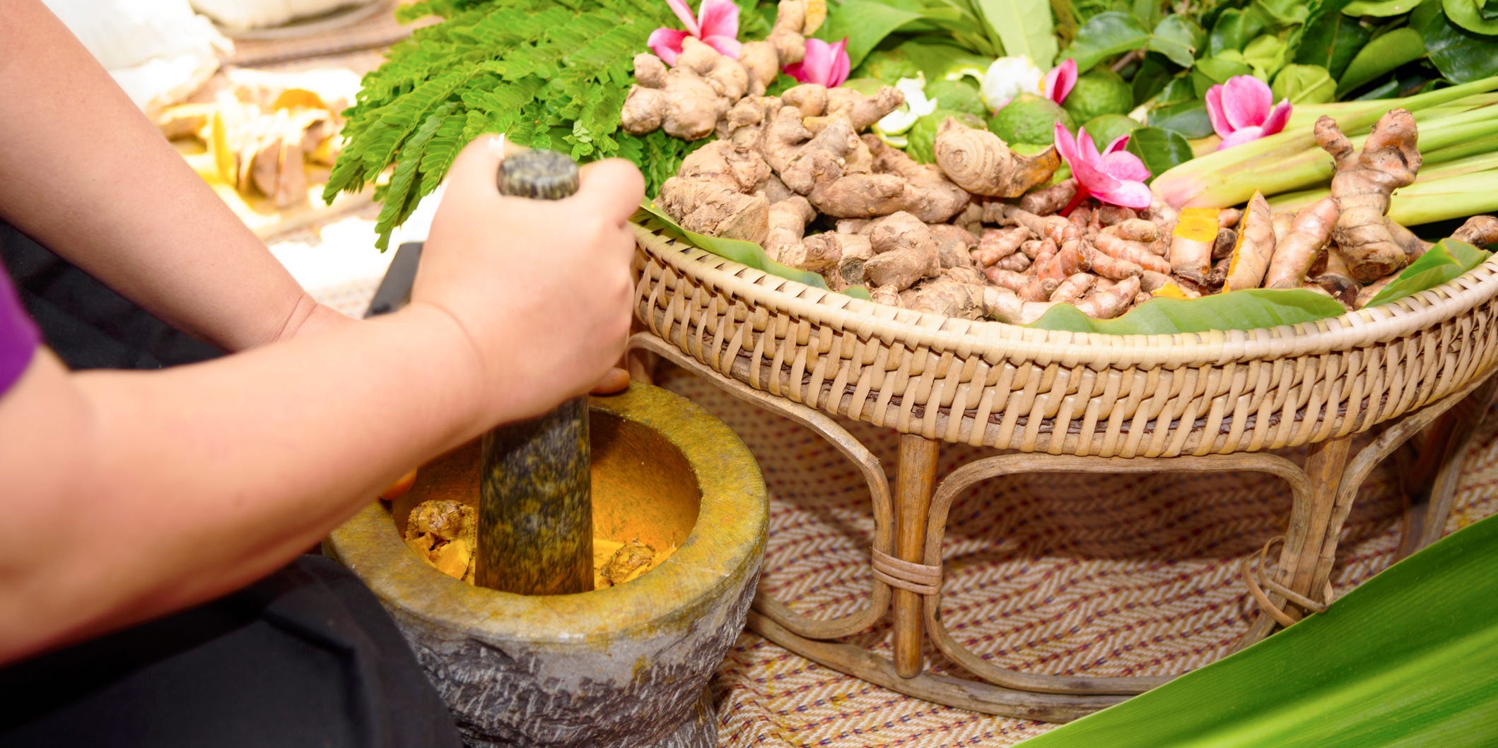 ashwagandha root being ground into a powder