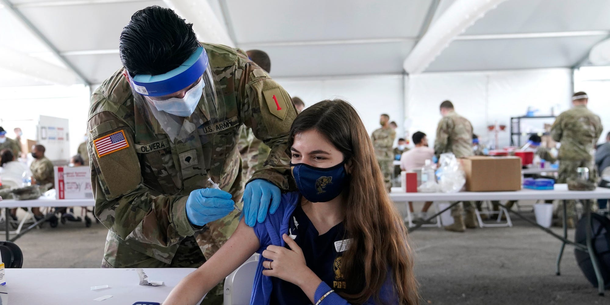 Natalie Ruiz,19, receives the Pfizer COVID-19 vaccine at a FEMA vaccination center at Miami Dade College, Monday, April 5, 2021, in Miami.