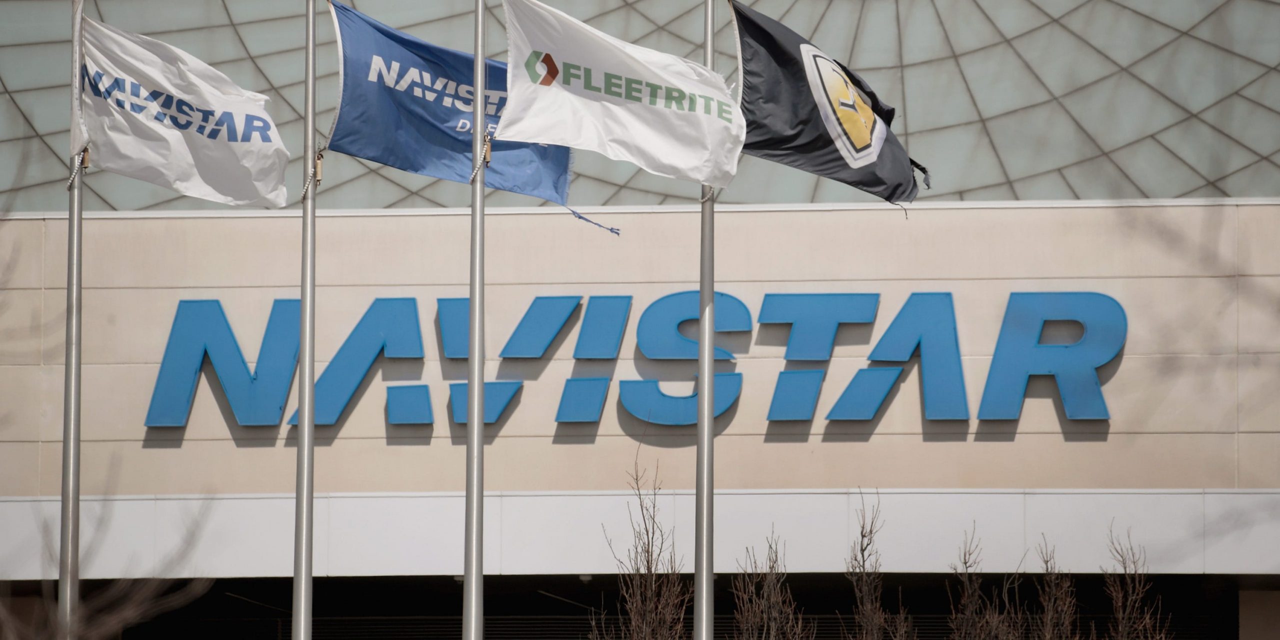 Flags fly in front of Navistar's corporate headquarters on April 17, 2018 in Lisle, Illinois.