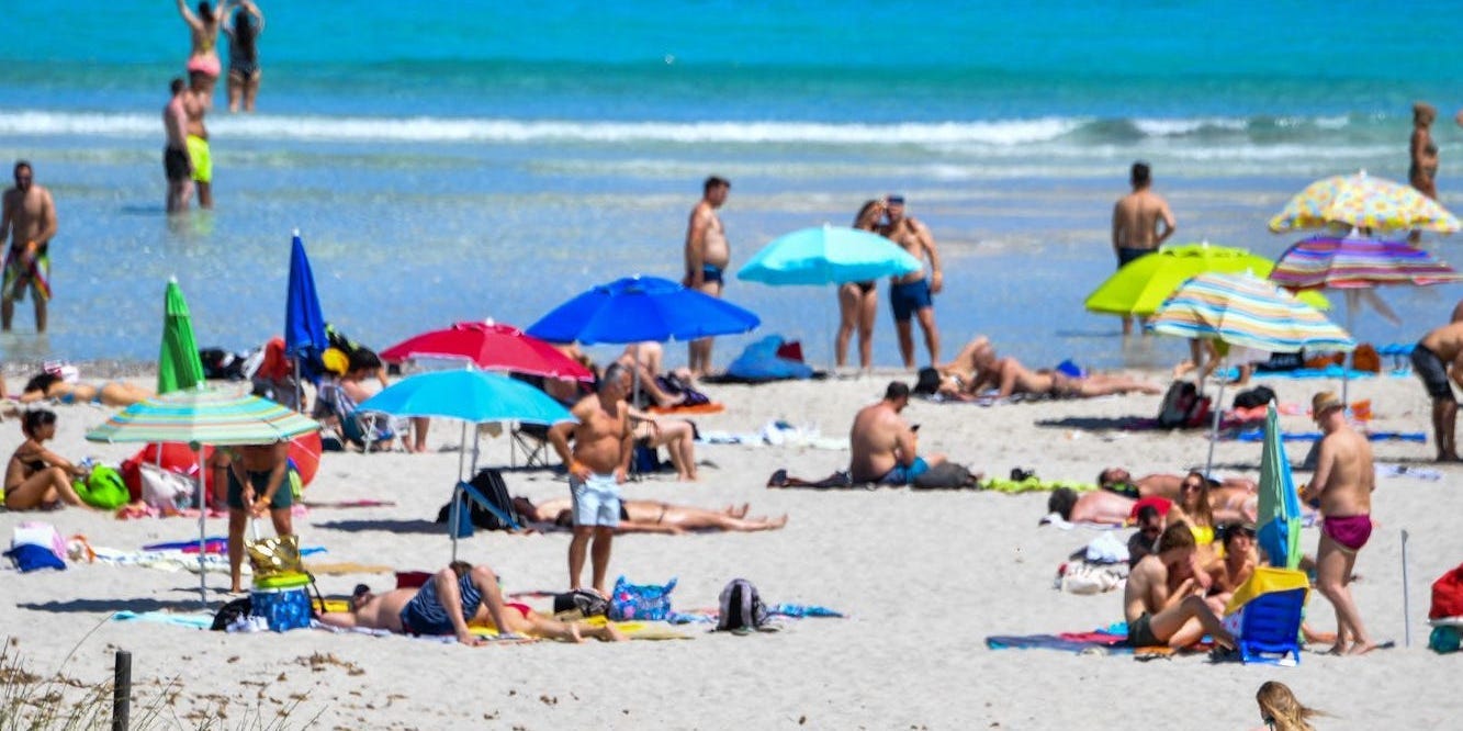 Beachgoers at the Spiaggia della Pelosa in Stintino, Sardinia, on June 7, 2021.