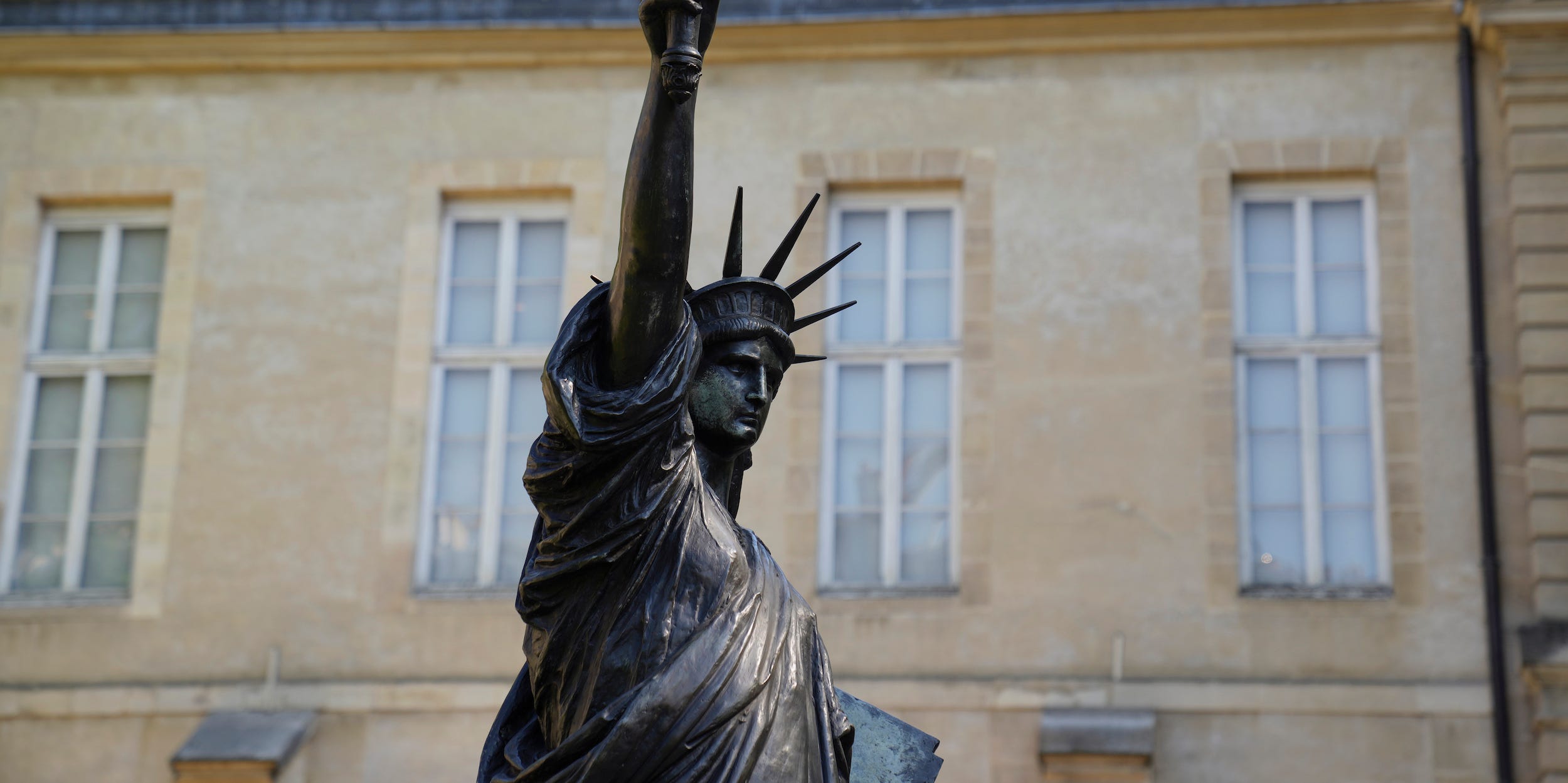 The "Liberty Enlightening the World" by Frederic Auguste Bartholdi, a mini-replica of the French-designed Statue of Liberty, is waiting for its move, in Paris, Monday, June 7, 2021.