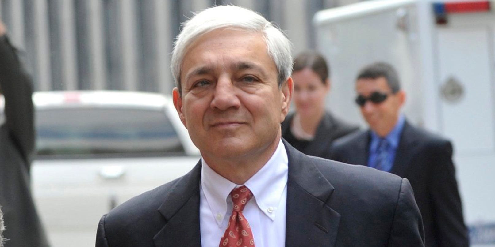 Former Penn State president Graham Spanier, accused of covering up Jerry Sandusky abuse allegations, leaves his preliminary hearing in Harrisburg, Pennsylvania, Tuesday, July 30, 2013.