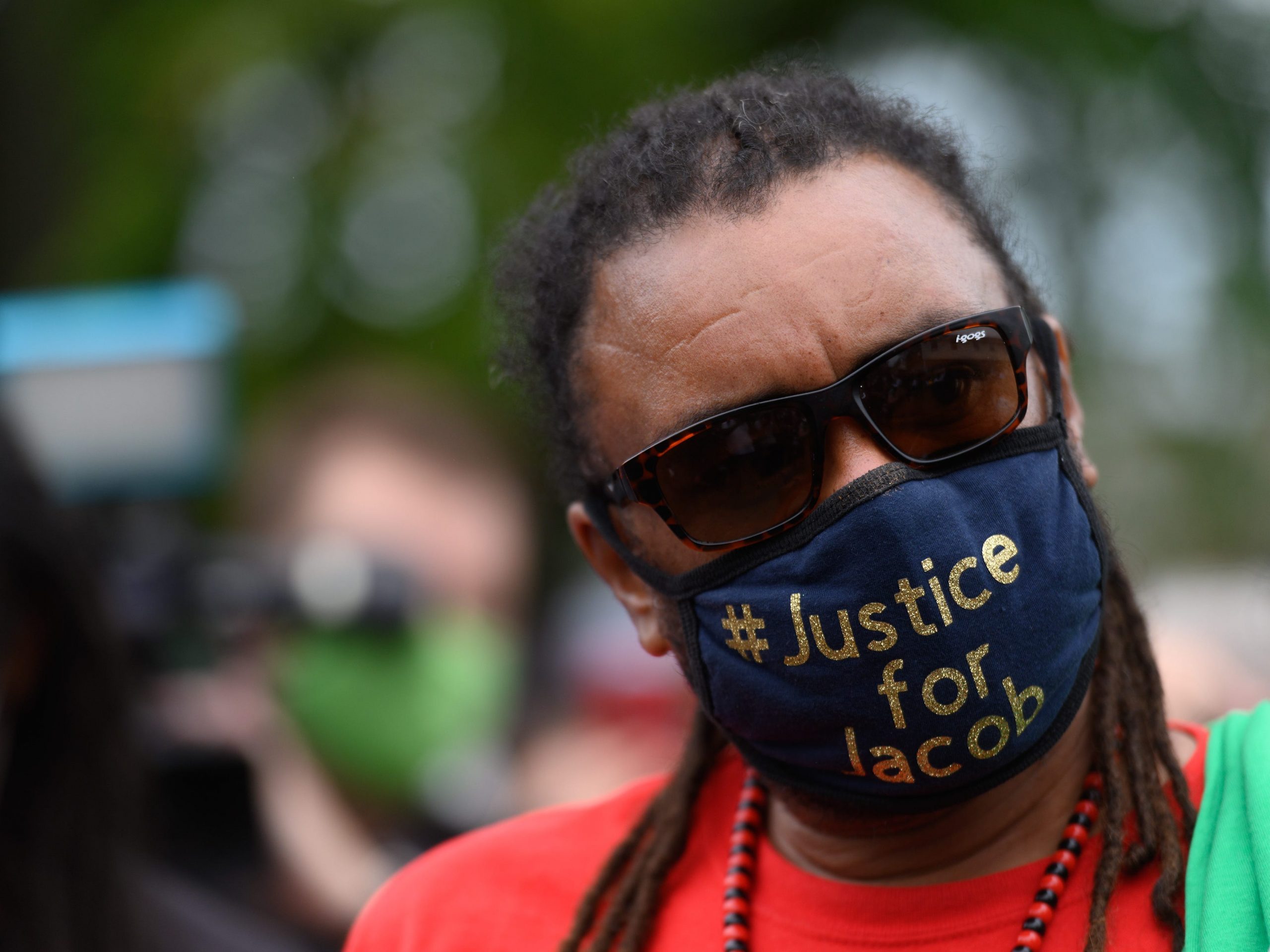 justin blake wears a mask that says justice for jacob