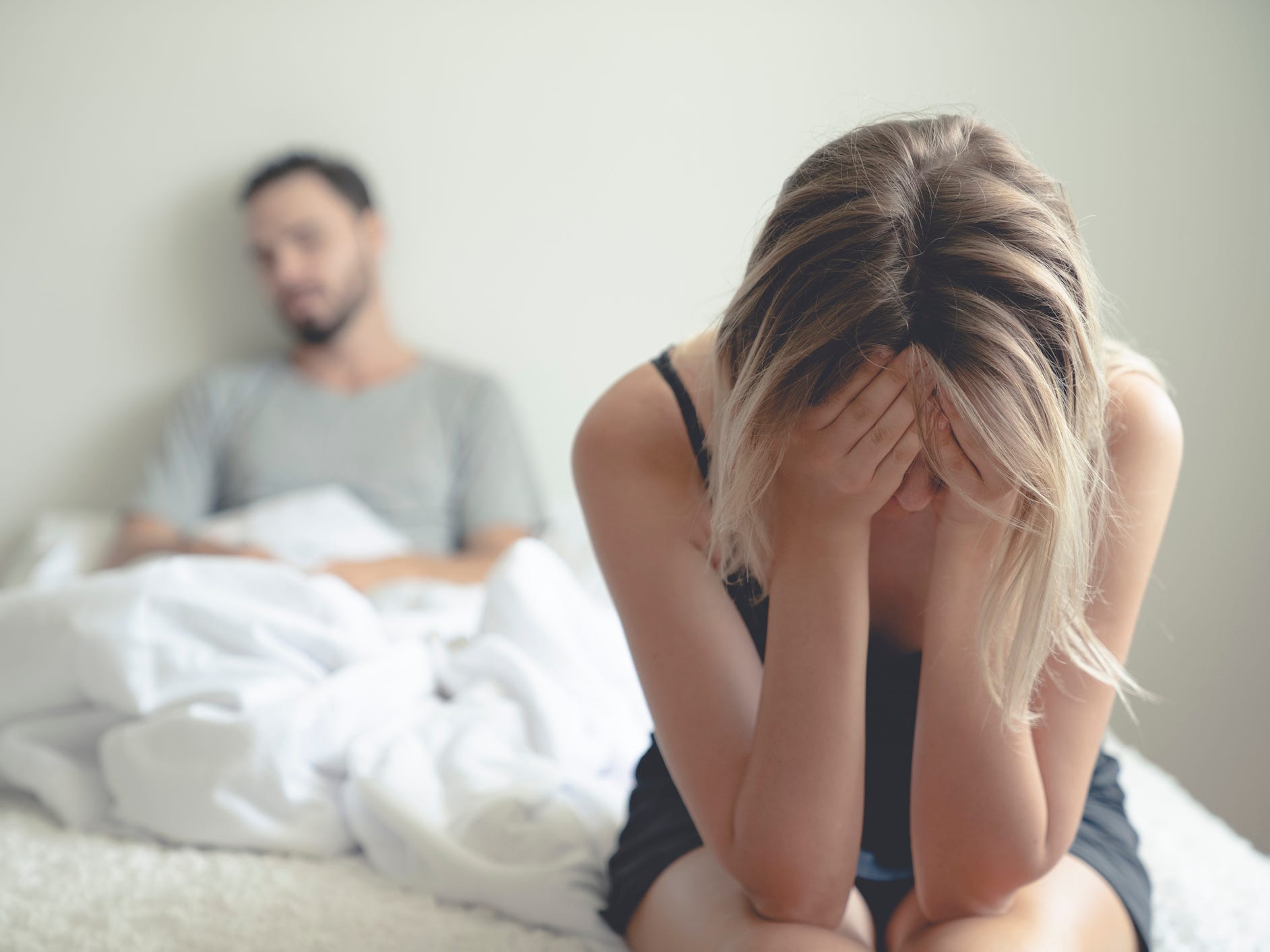 Couple upset in bed